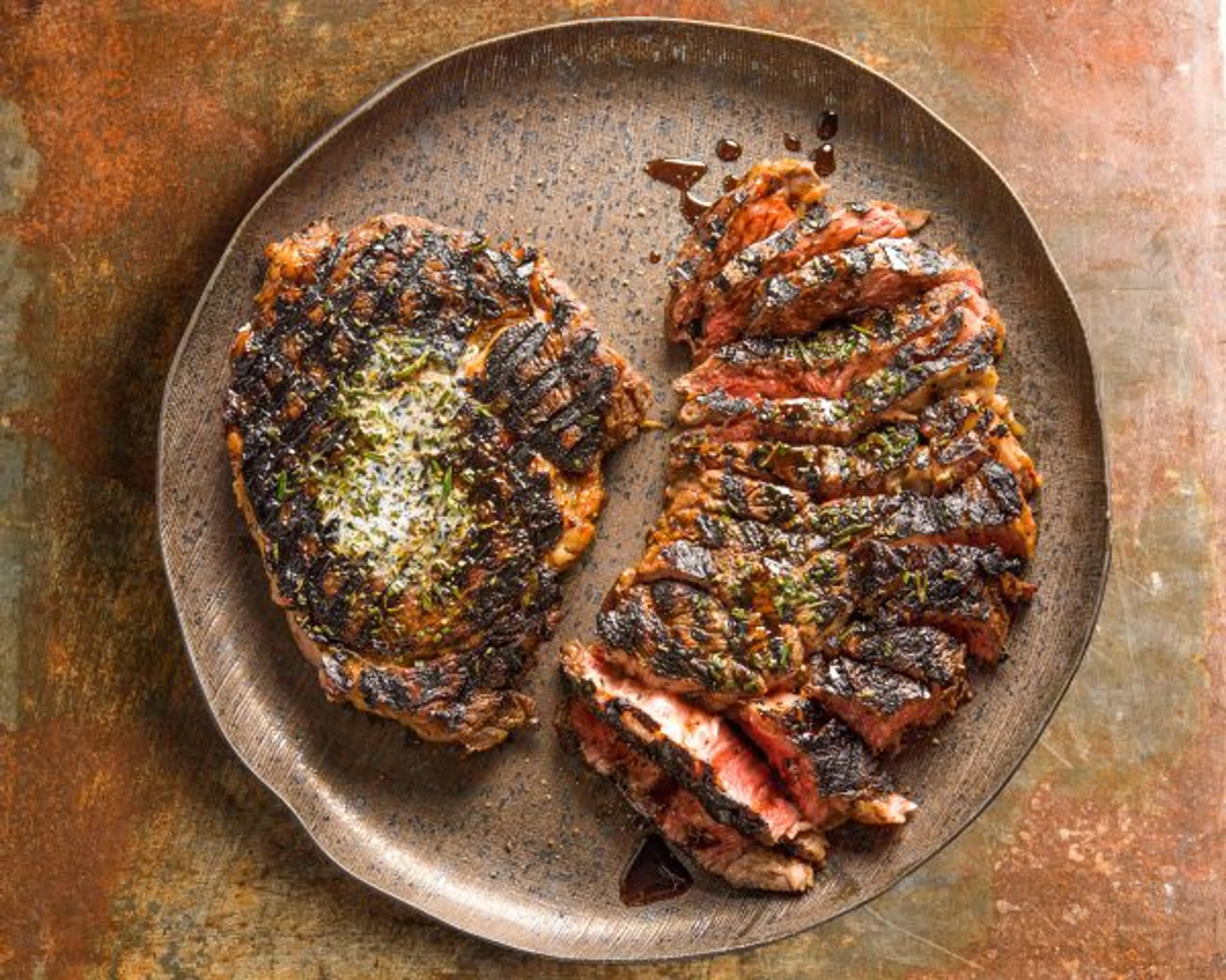 Rib-Eye Steaks with Rosemary and Pomegranate Molasses