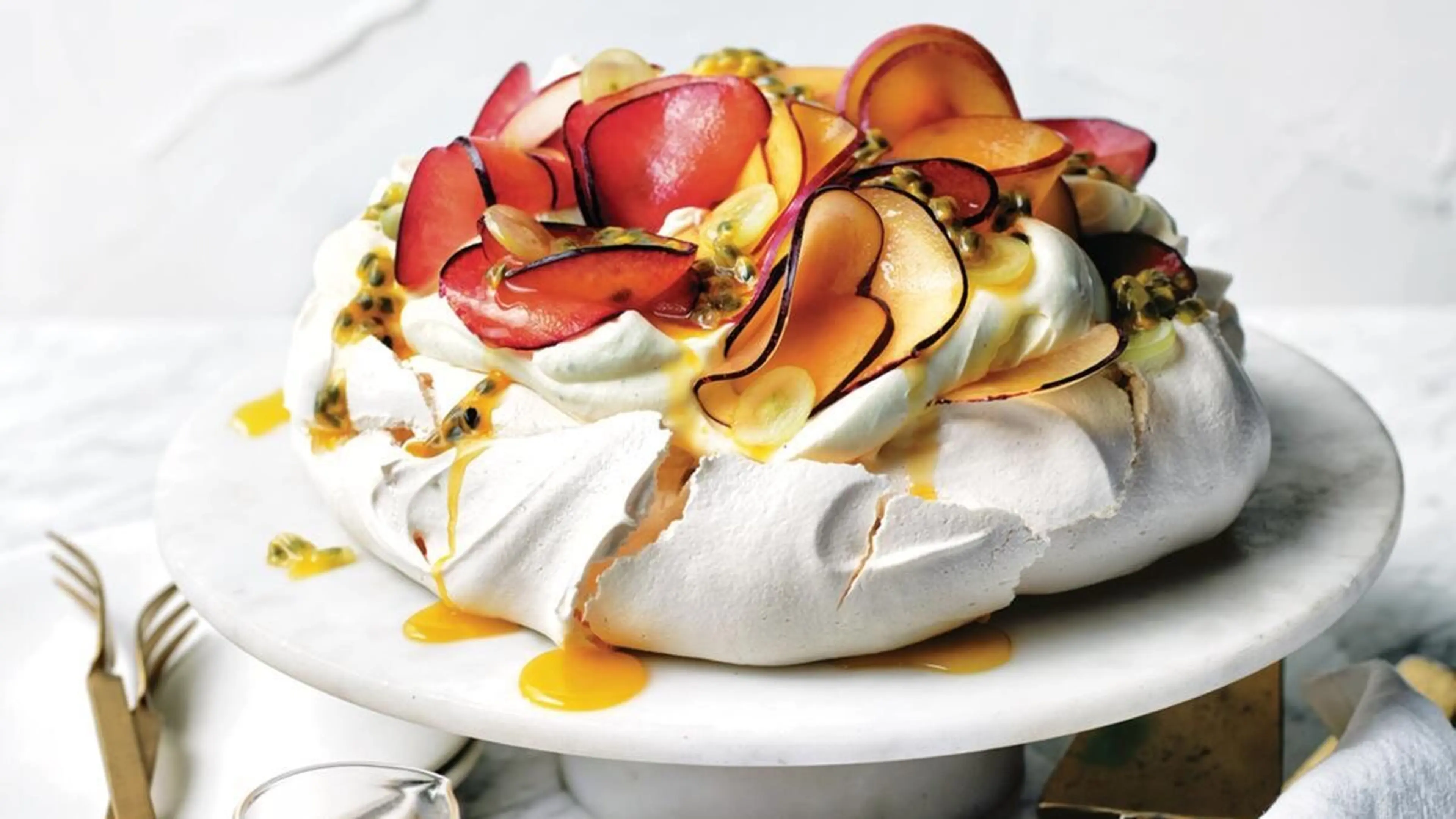 Yotam Ottolenghi's rosemary, orange and passionfruit pavlova