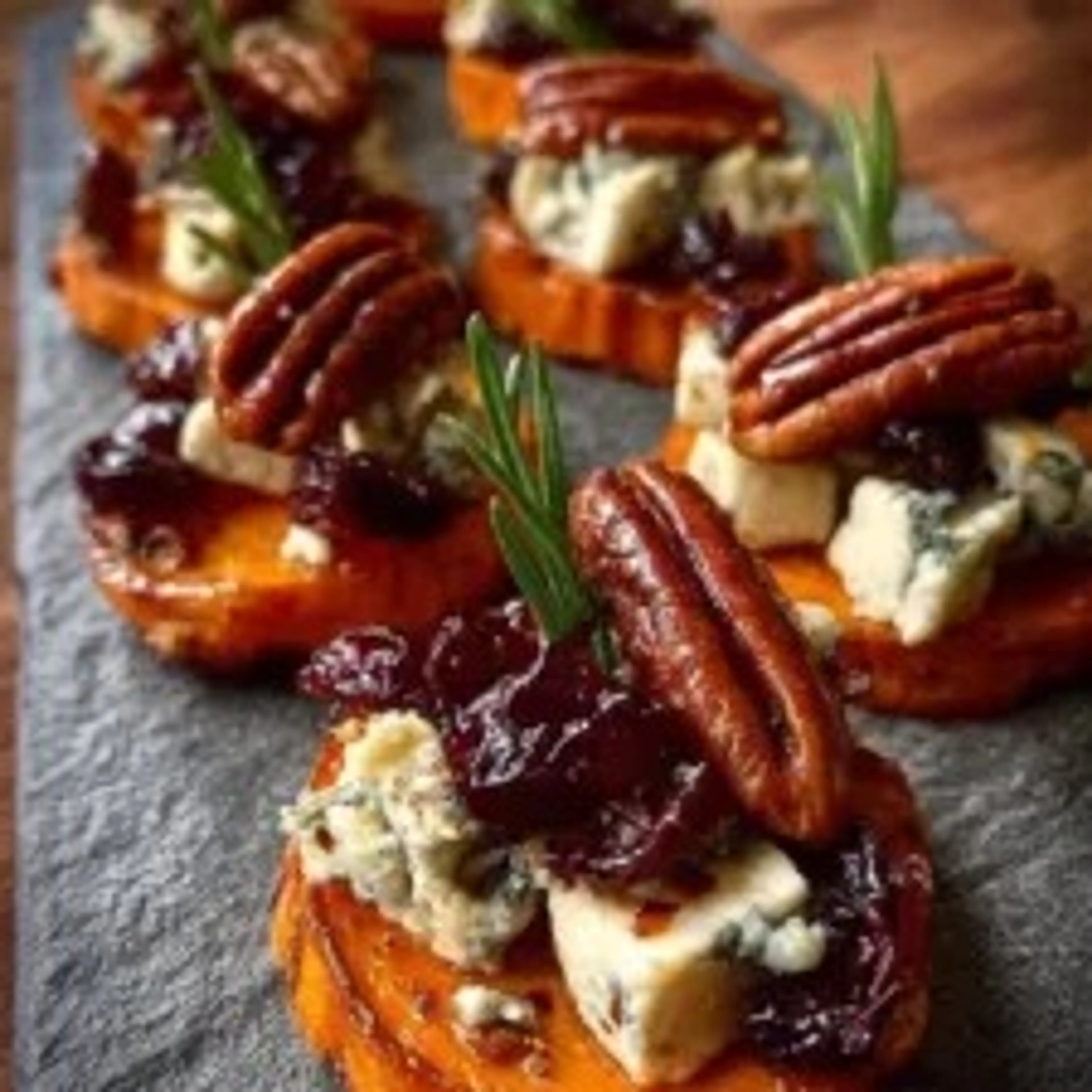 Sweet Potato Rounds with Blue Cheese, Cranberry and Pecans