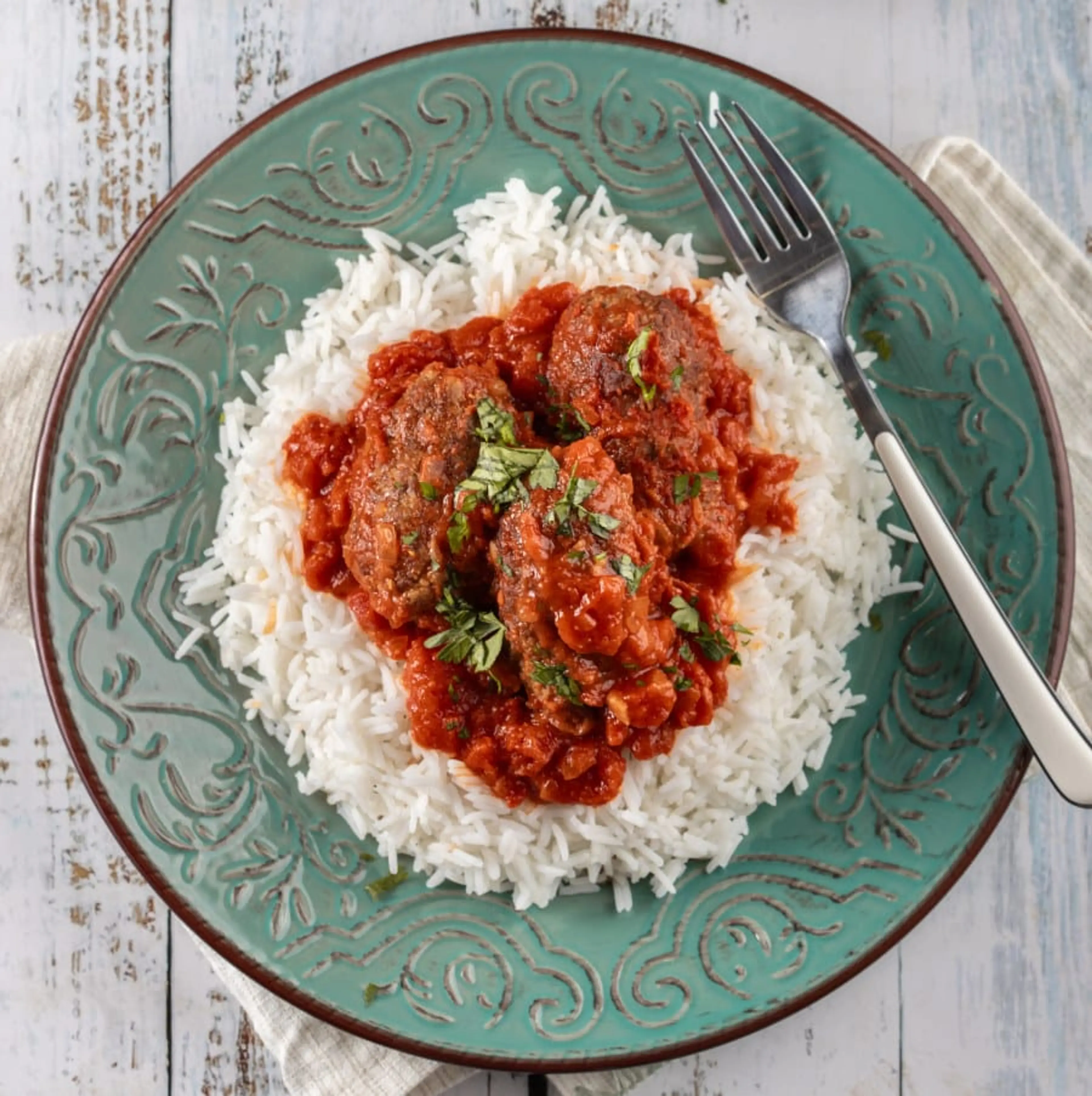 Soutzoukakia (Greek Meatballs in Red Sauce) with Rice