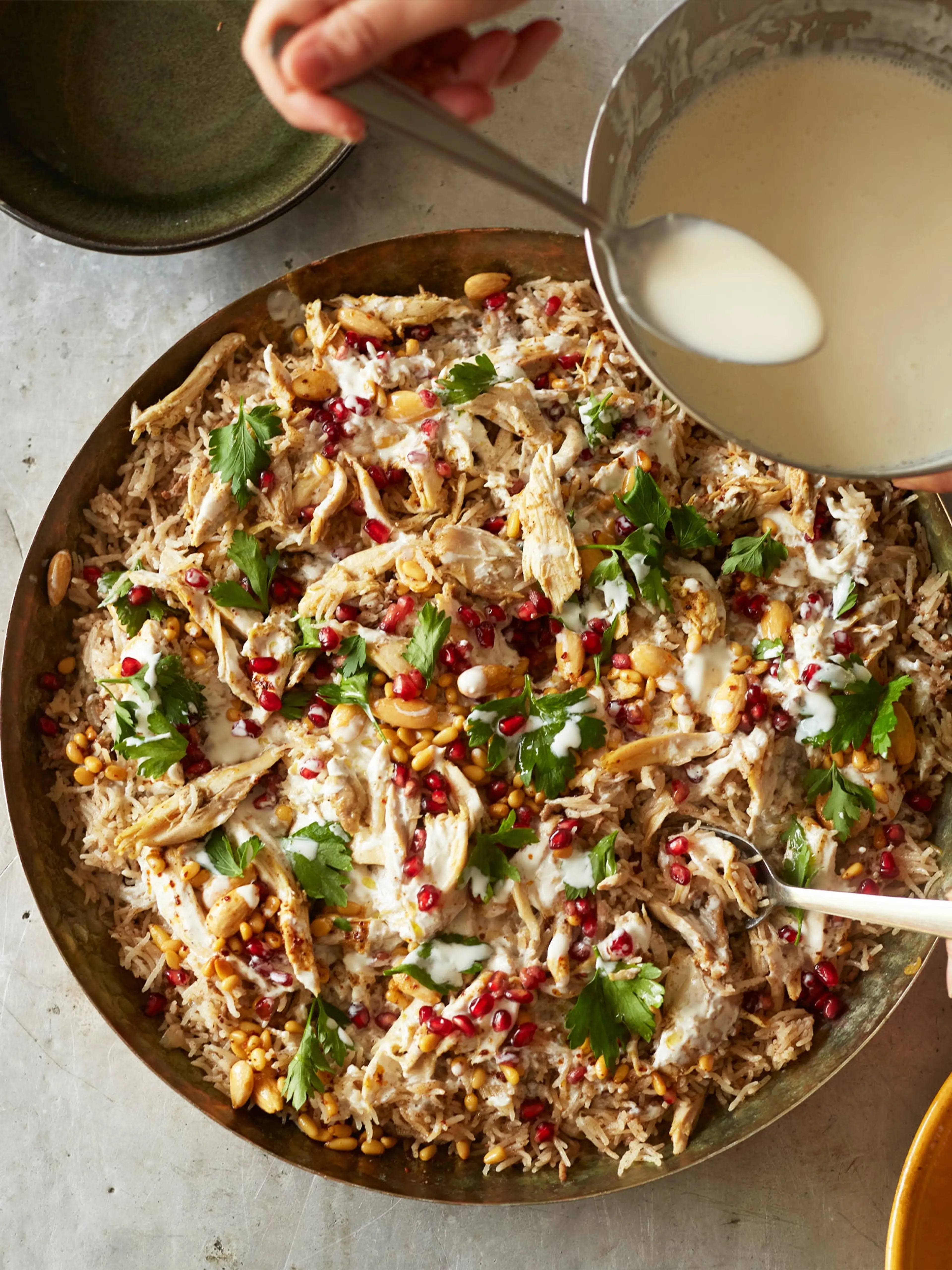 Celebration rice with lamb, chicken and garlic yoghurt