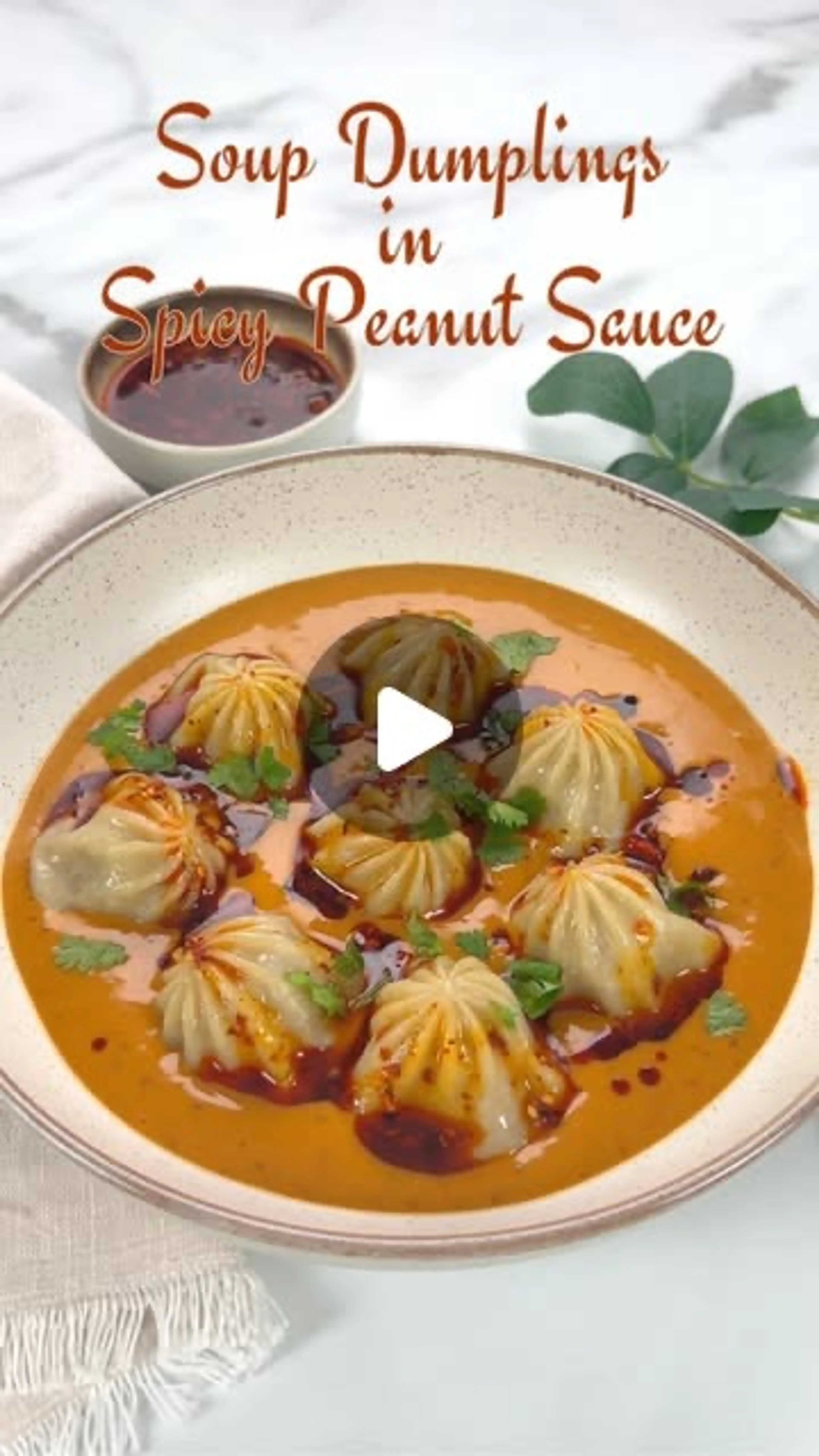 Soup Dumplings in Spicy Peanut Sauce