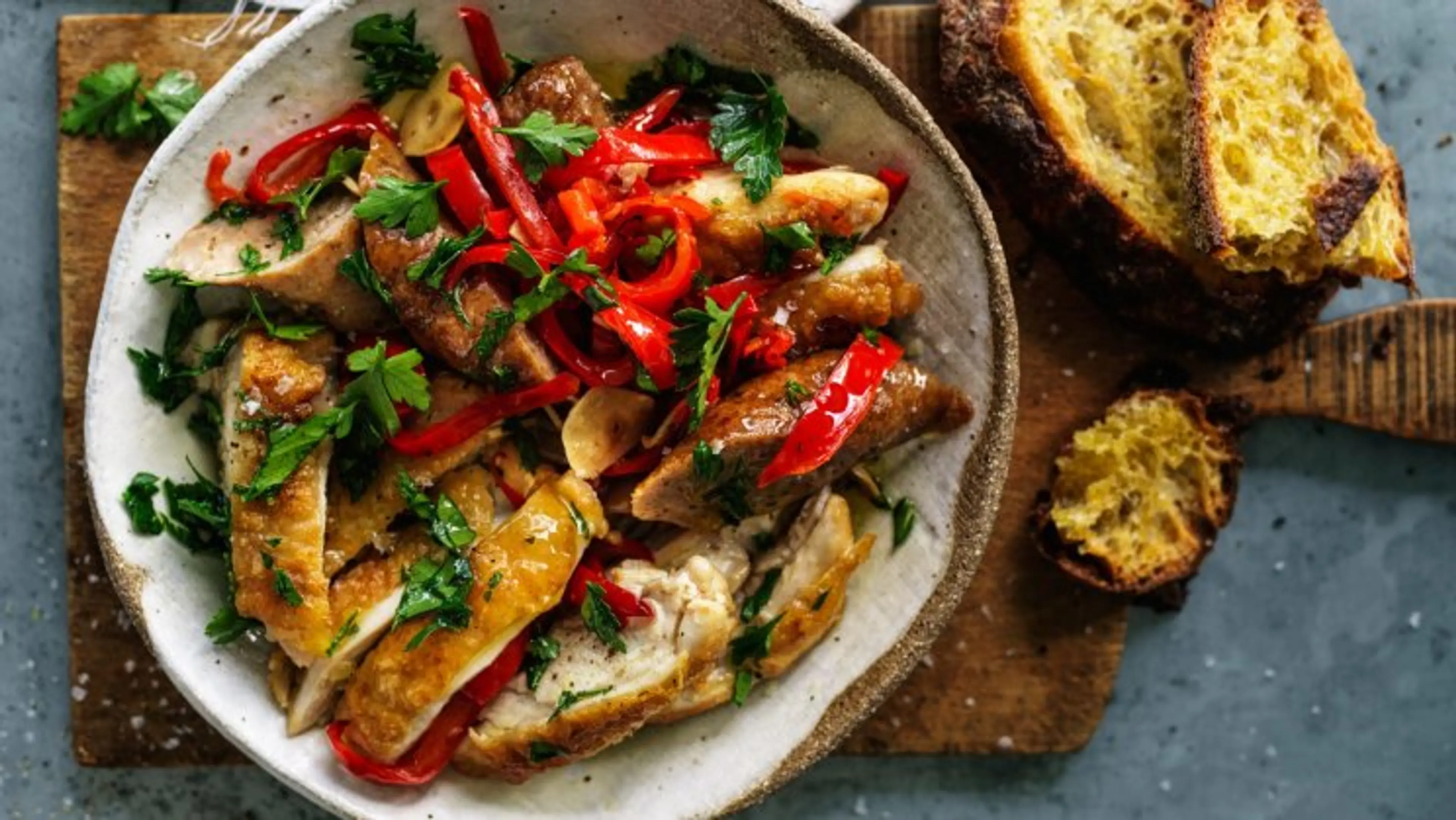 Sweet and spicy chicken and sausage tray bake