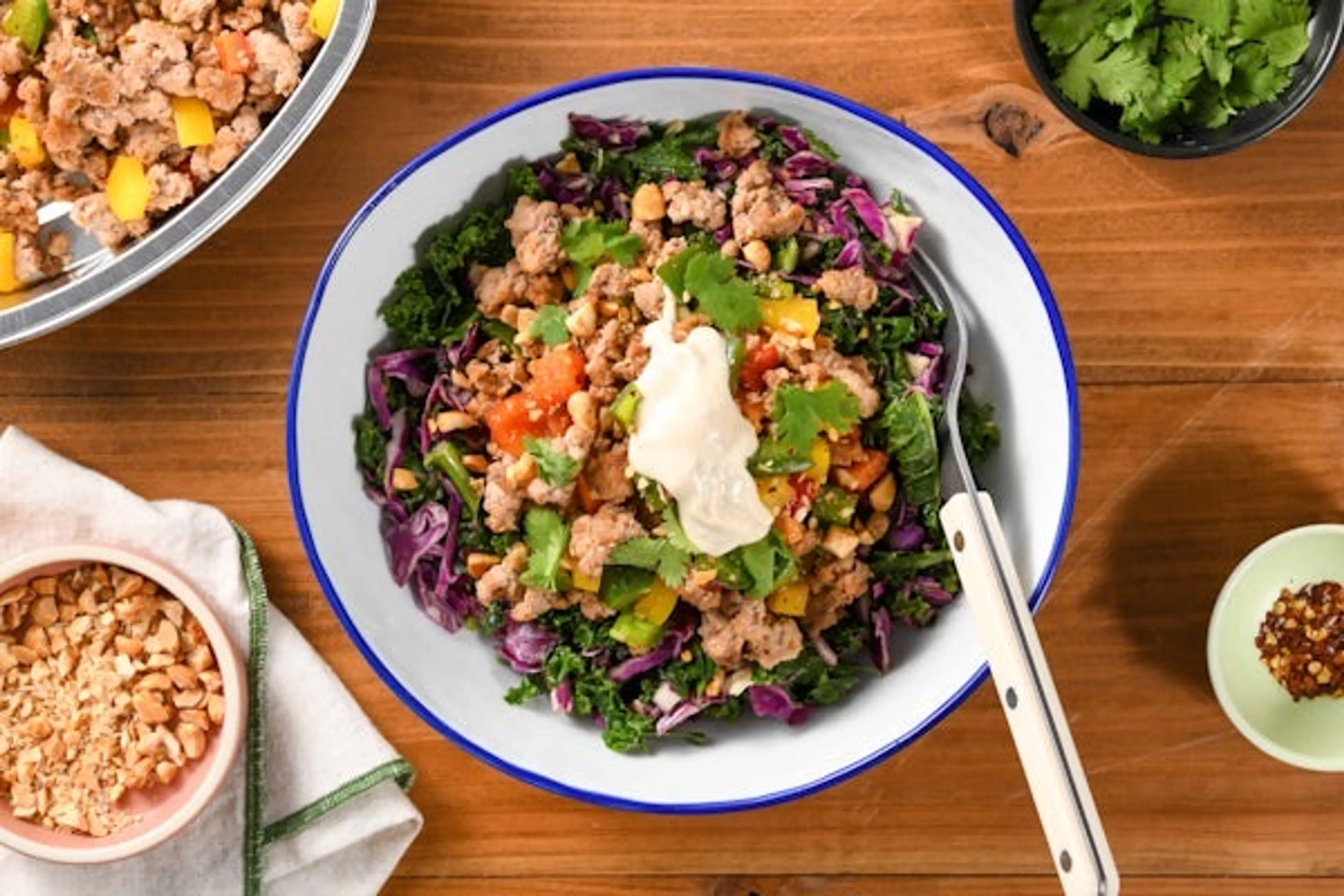 Thai-Style Ground Pork and Cabbage Bowl with sesame, peanuts