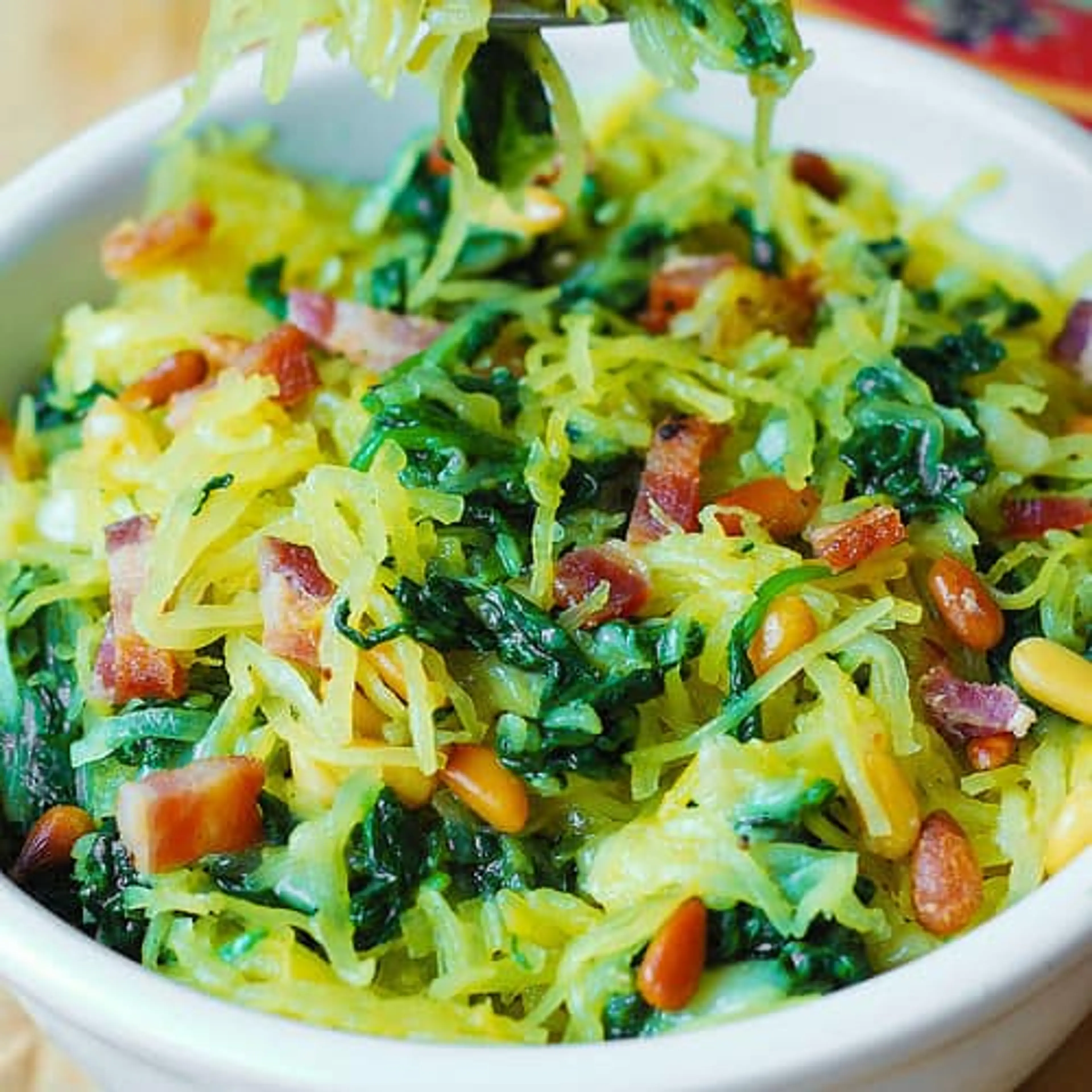 Parmesan Spaghetti Squash, Spinach, and Bacon with Pine Nuts