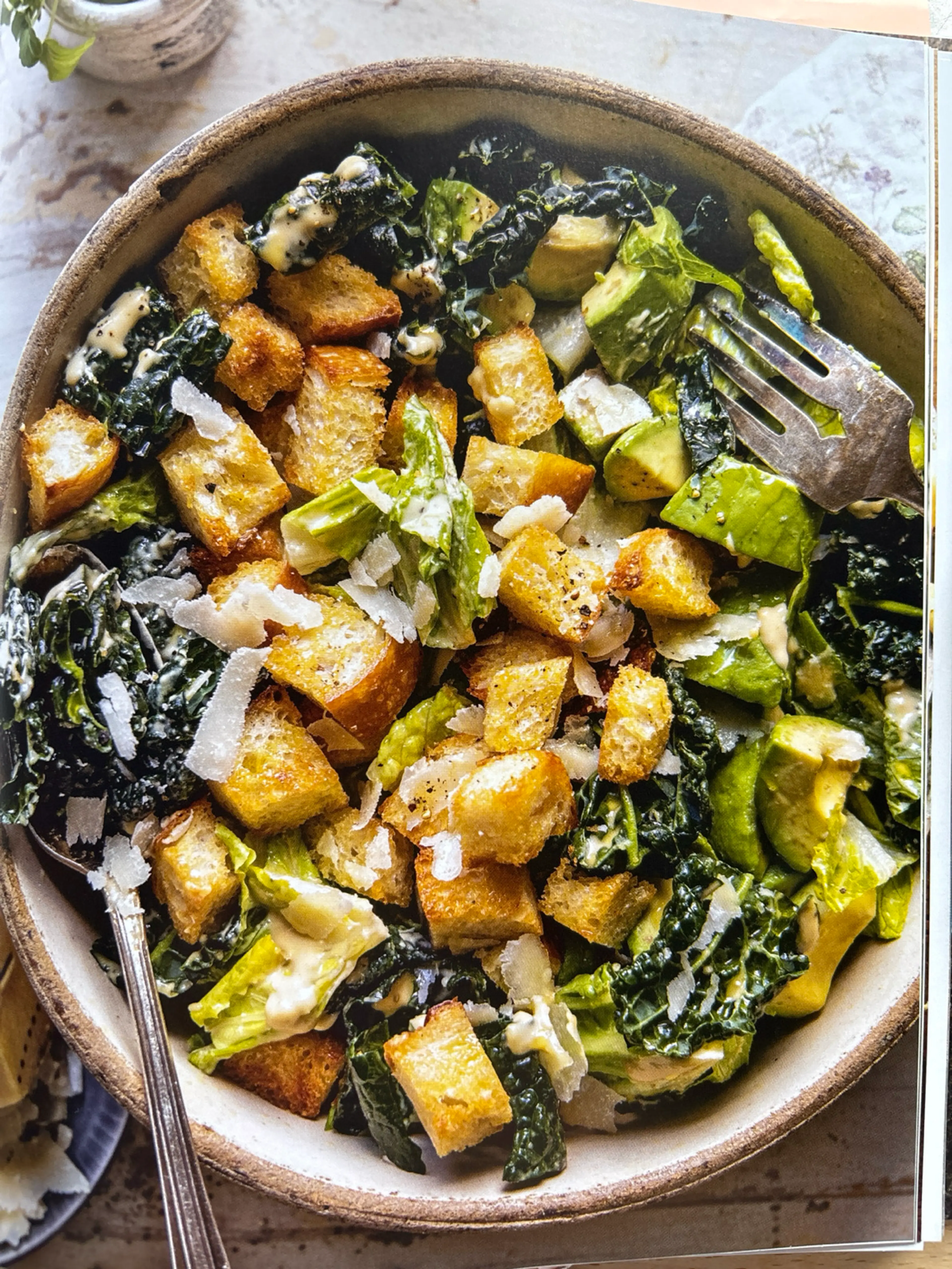 kale caesar croutons with house dressing and sourdough