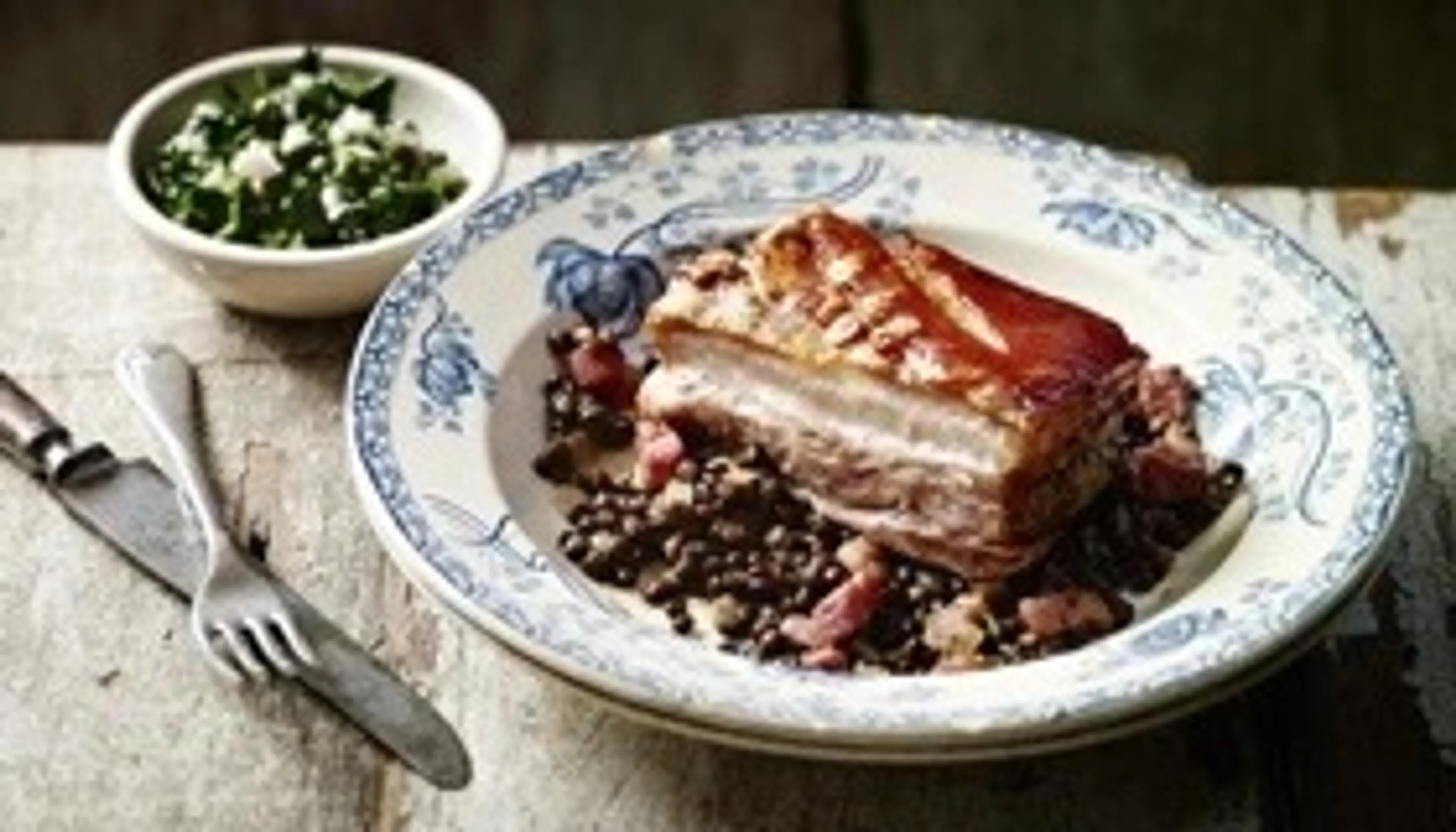 Pork belly with lentils and black cabbage salsa