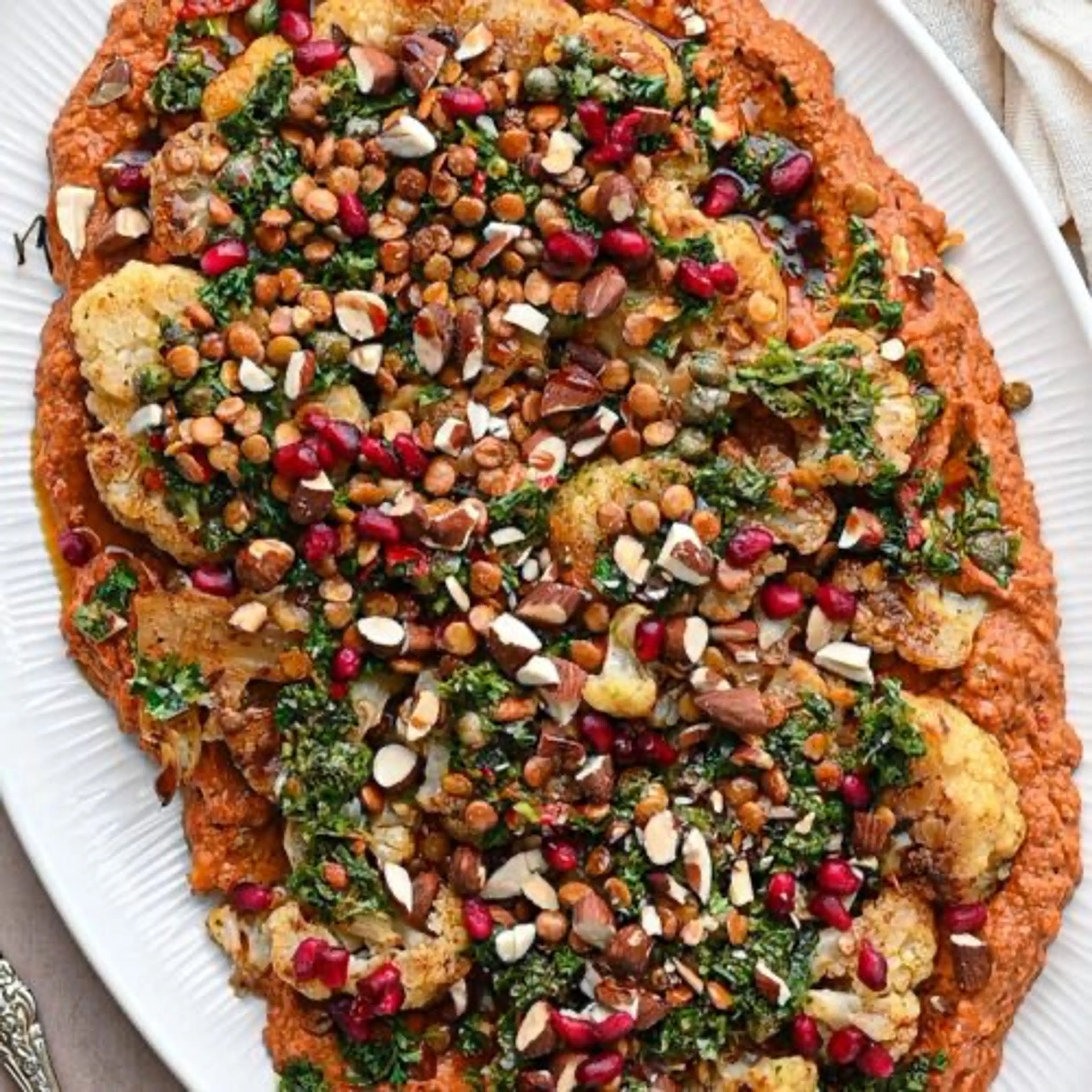 Spiced Cauliflower Steaks with Muhammara Hummus