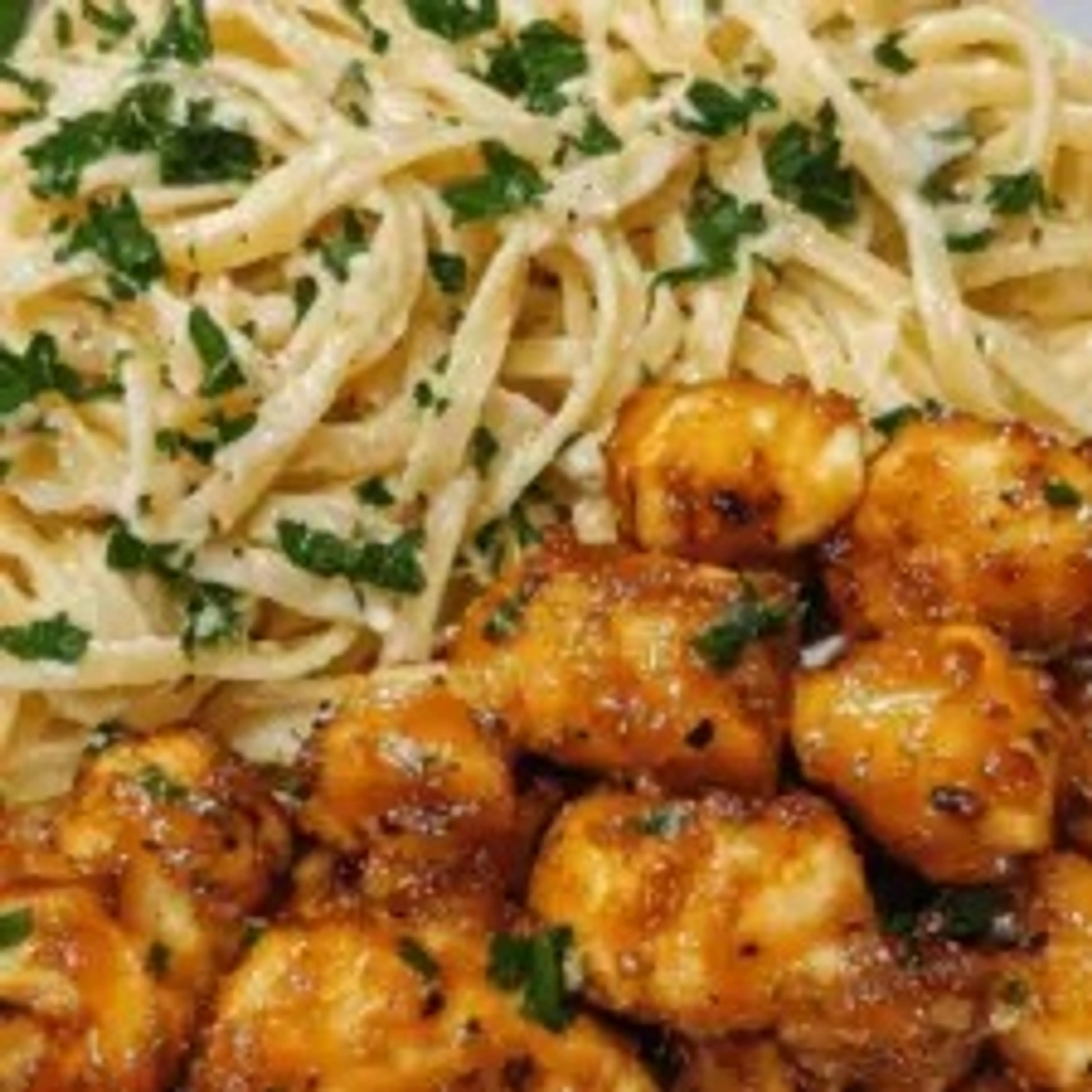 Lemon Garlic Butter Chicken Bites with Savory Parmesan Lingu