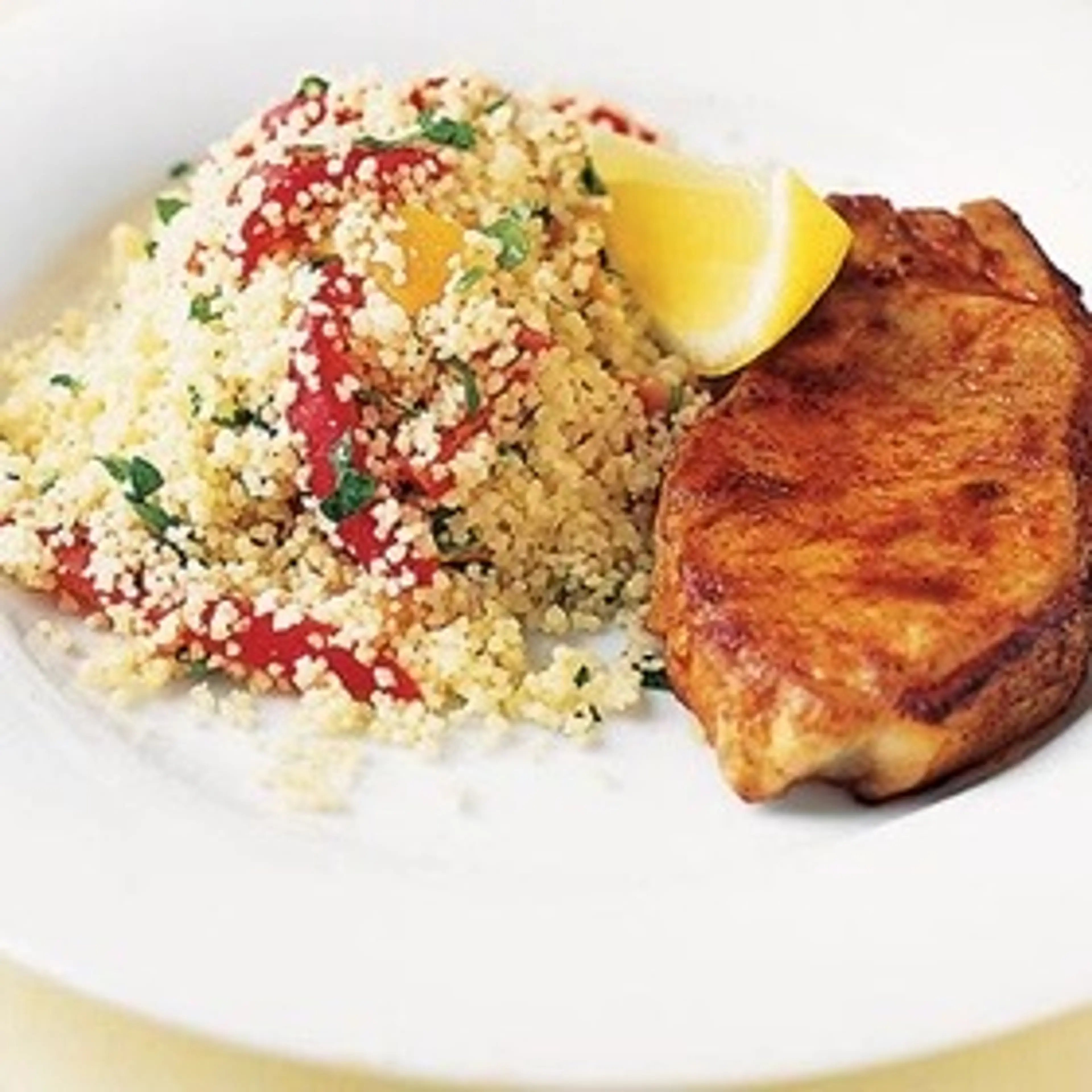 Paprika pork chops with roasted pepper couscous