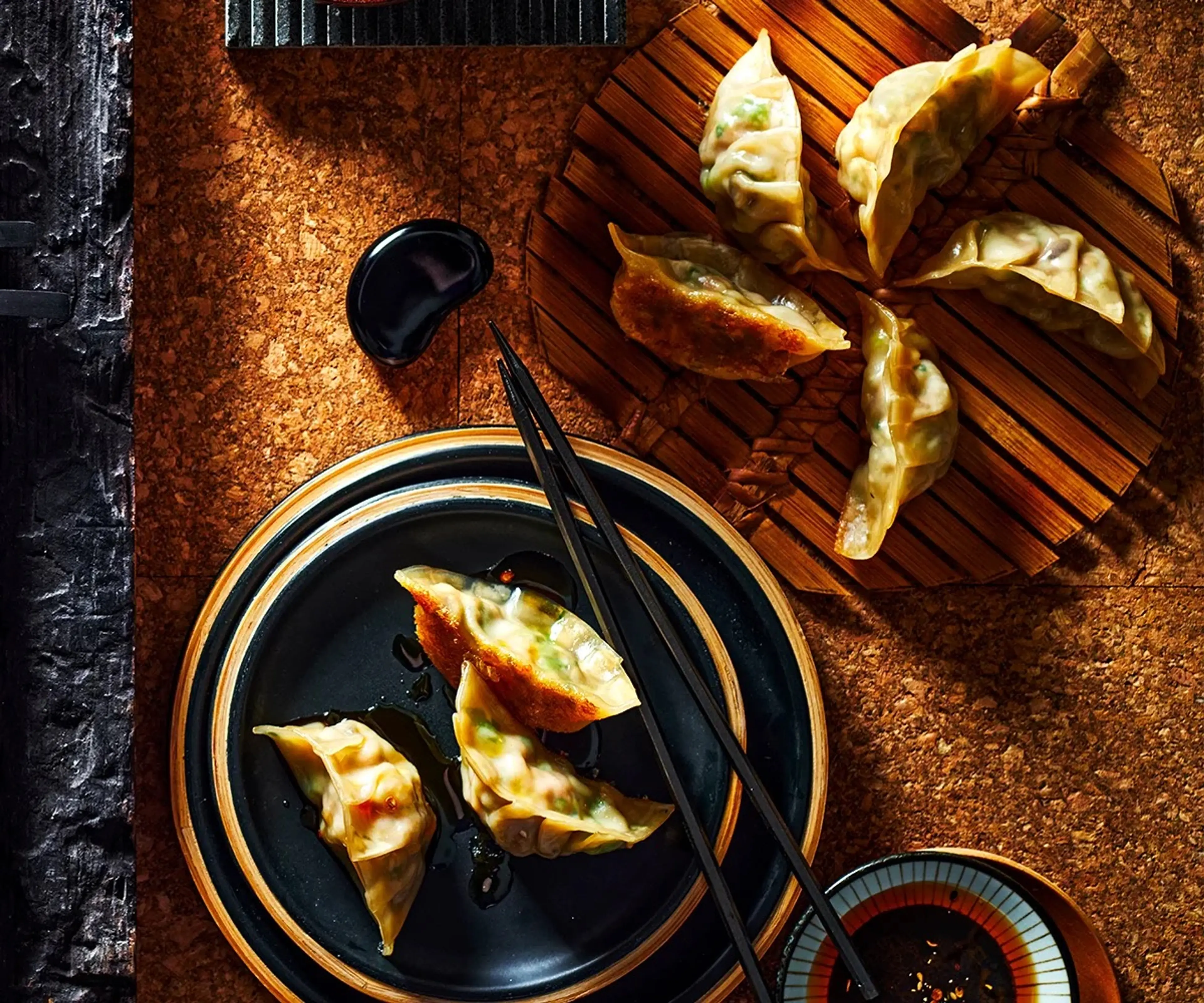 Crisp pork and ginger gyozas with sesame rayu