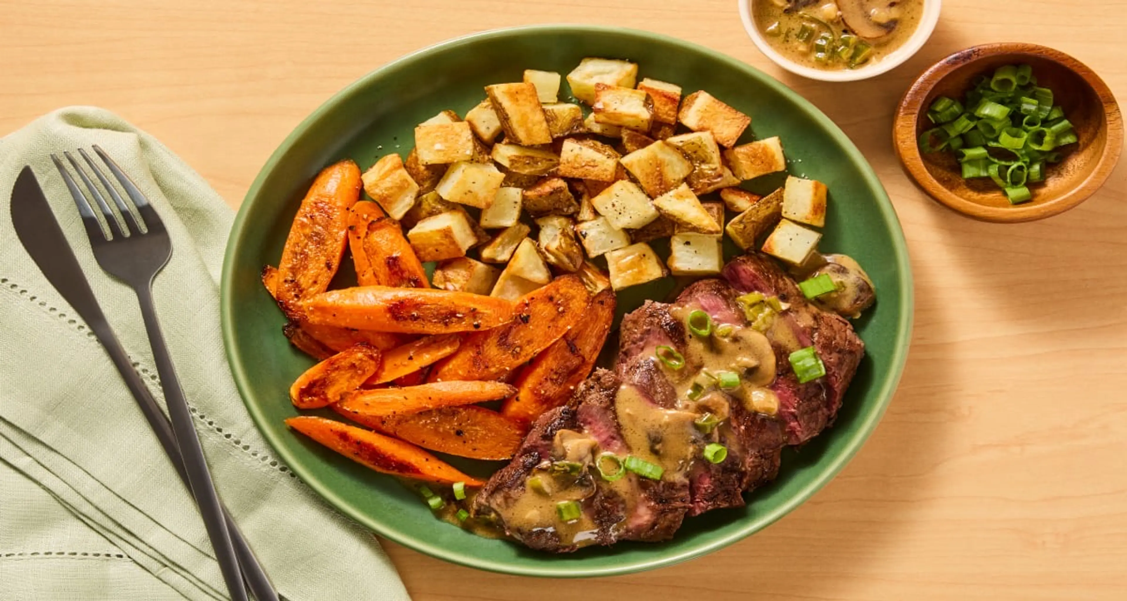 Steak with Mushroom Cream Sauce plus Roasted Potatoes & Carr