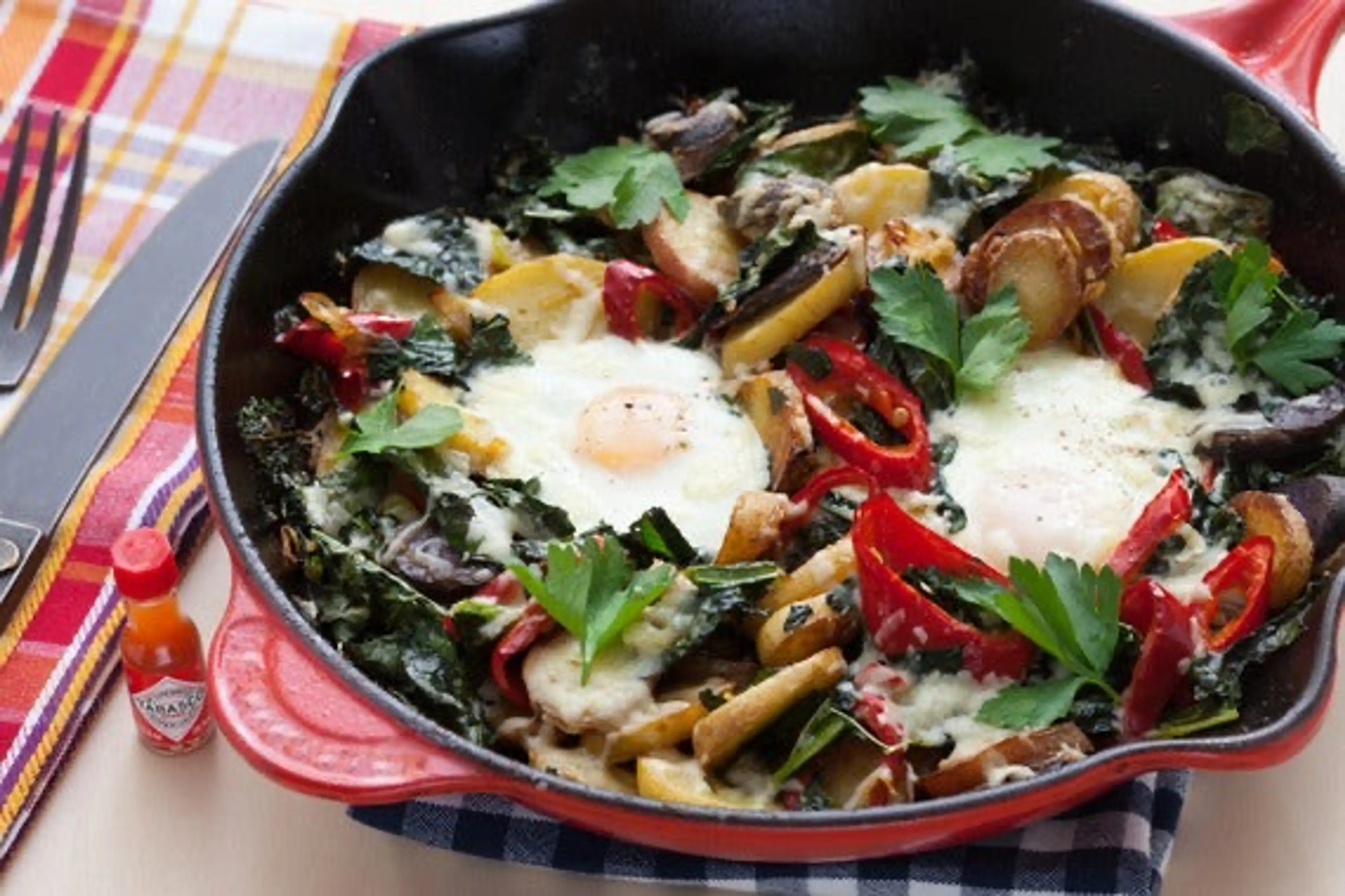 Fingerling Potato & Kale Hash with Baked Eggs & Aged Cheddar
