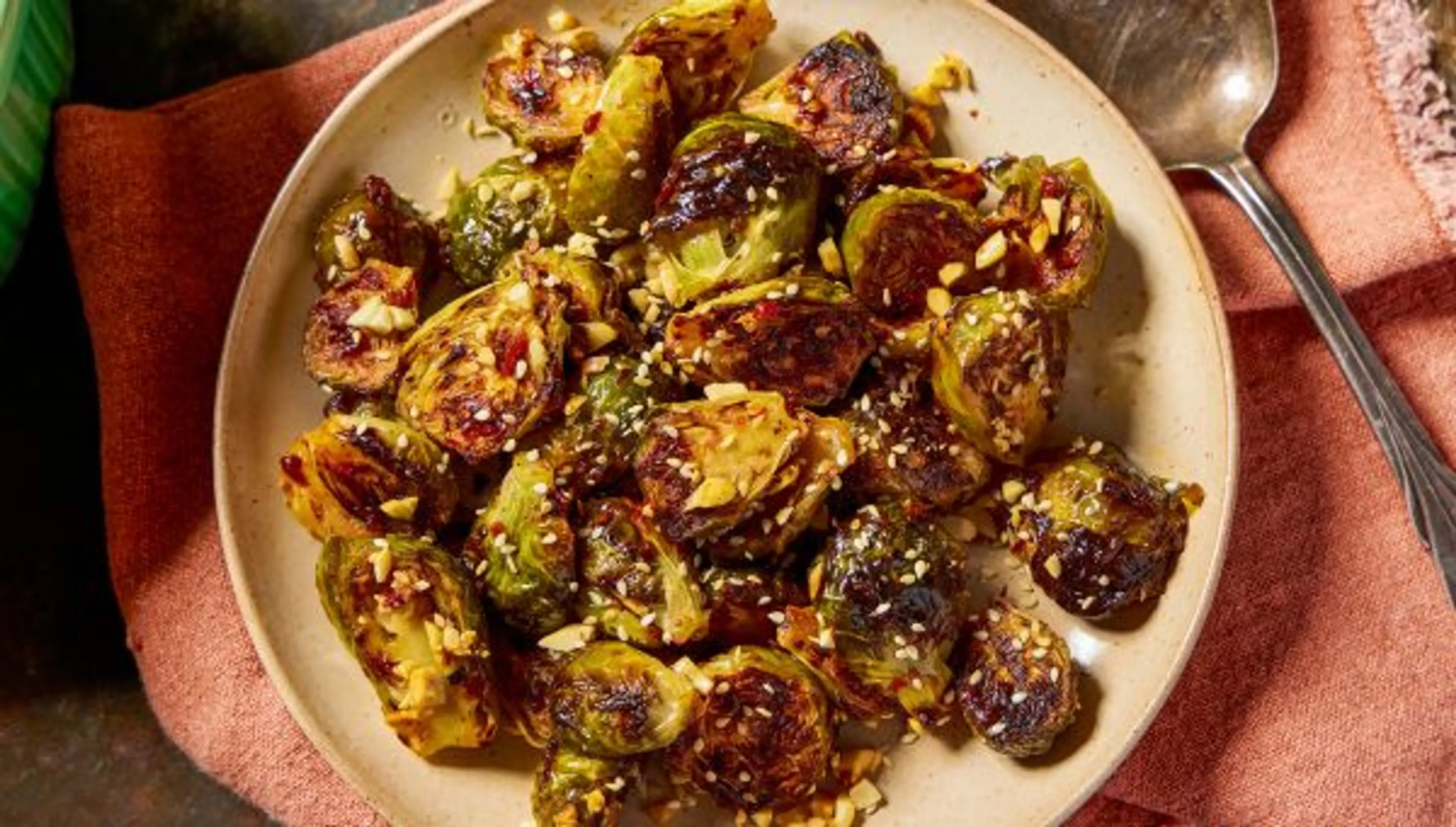 Oven-Charred Brussels Sprouts with Chipotle Chilies and Pean