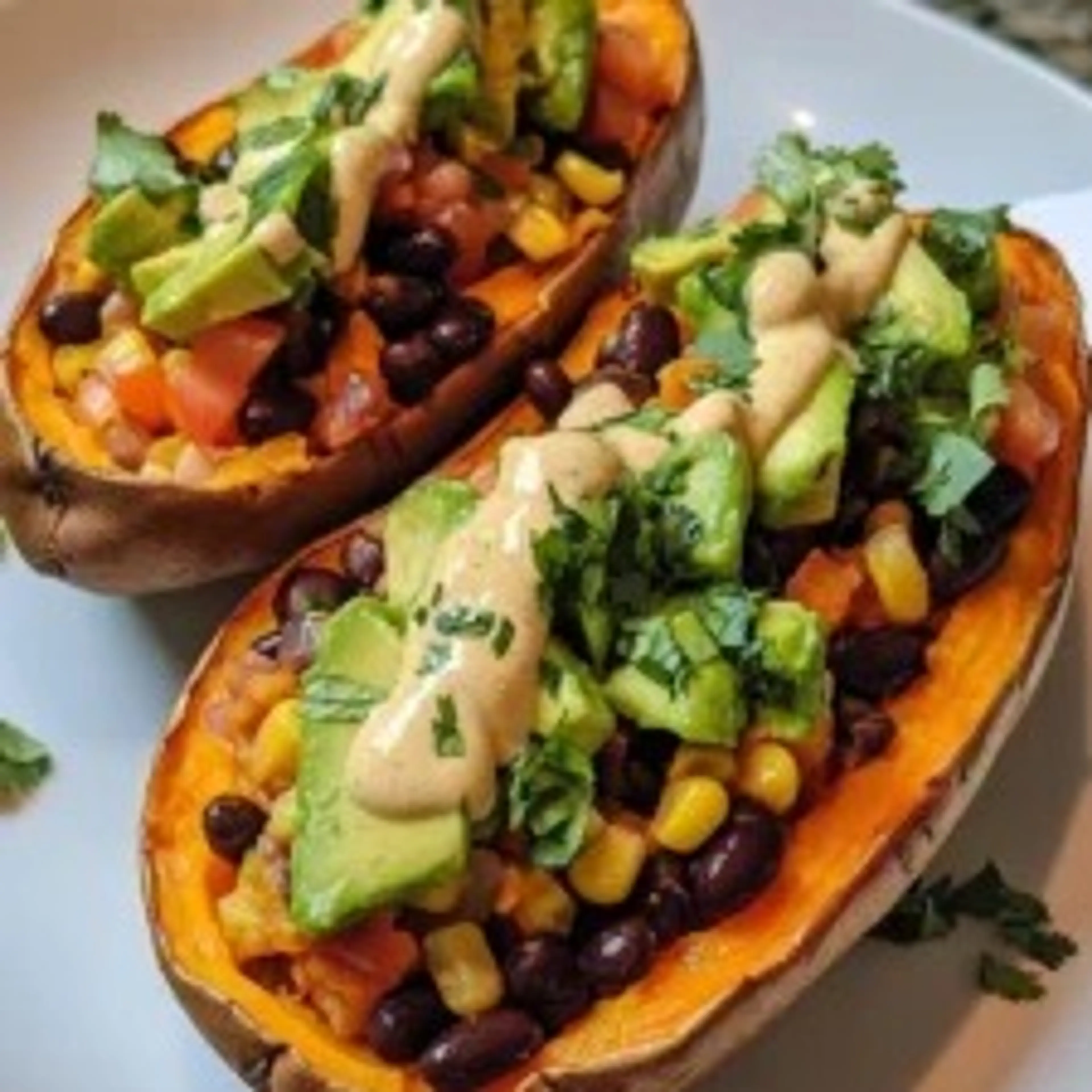 Stuffed Sweet Potato with Avocado, Black Beans & Cilantro Li
