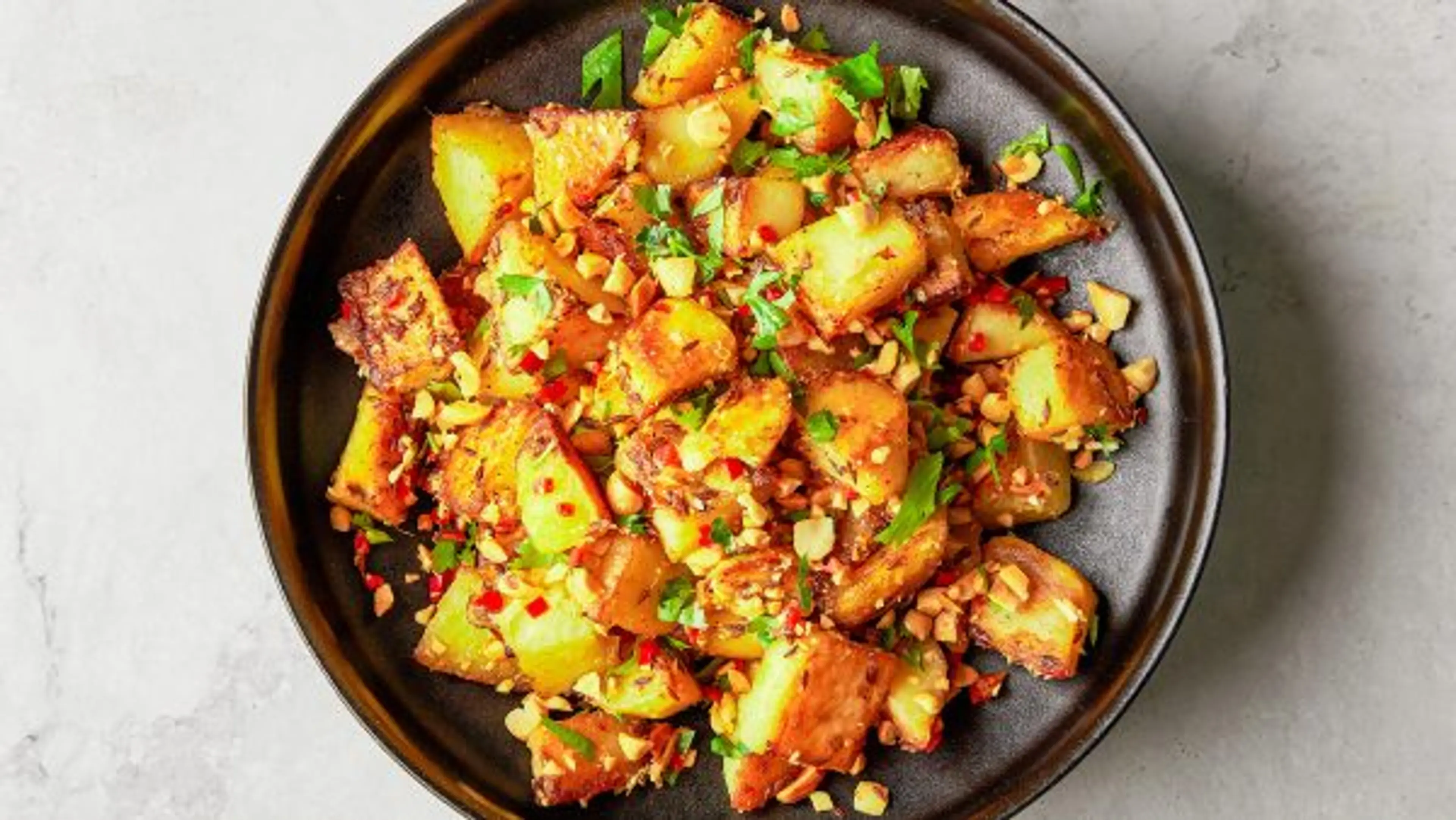 Pan-Fried Potatoes with Cumin, Cilantro and Peanuts