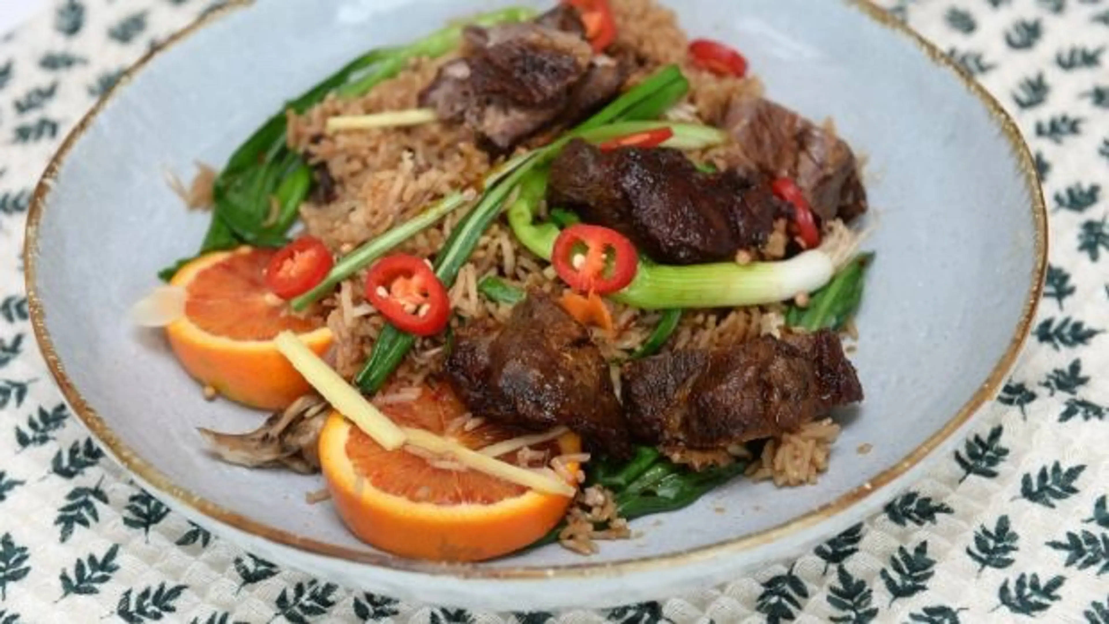Duck leg with wild garlic spiced rice