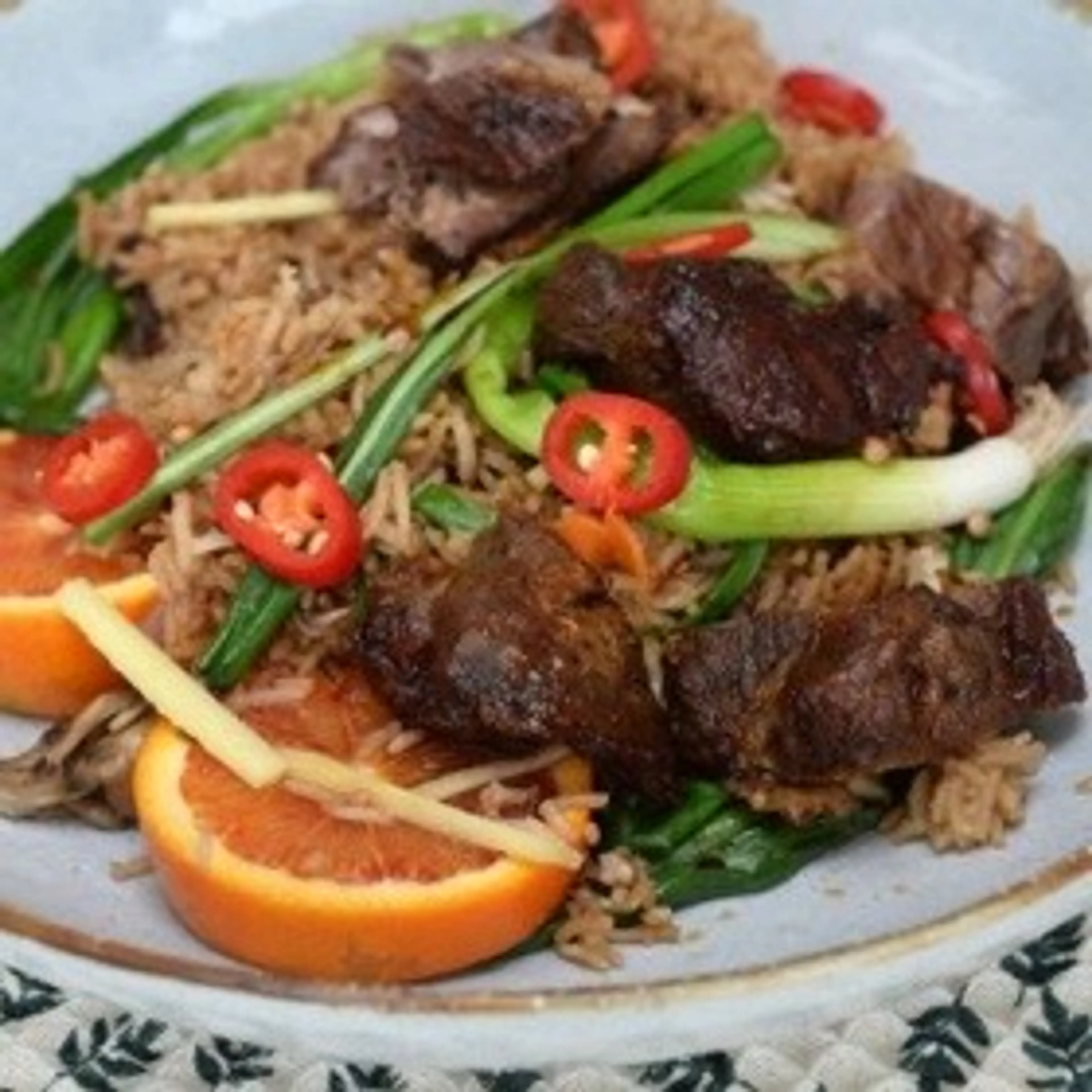 Duck leg with wild garlic spiced rice