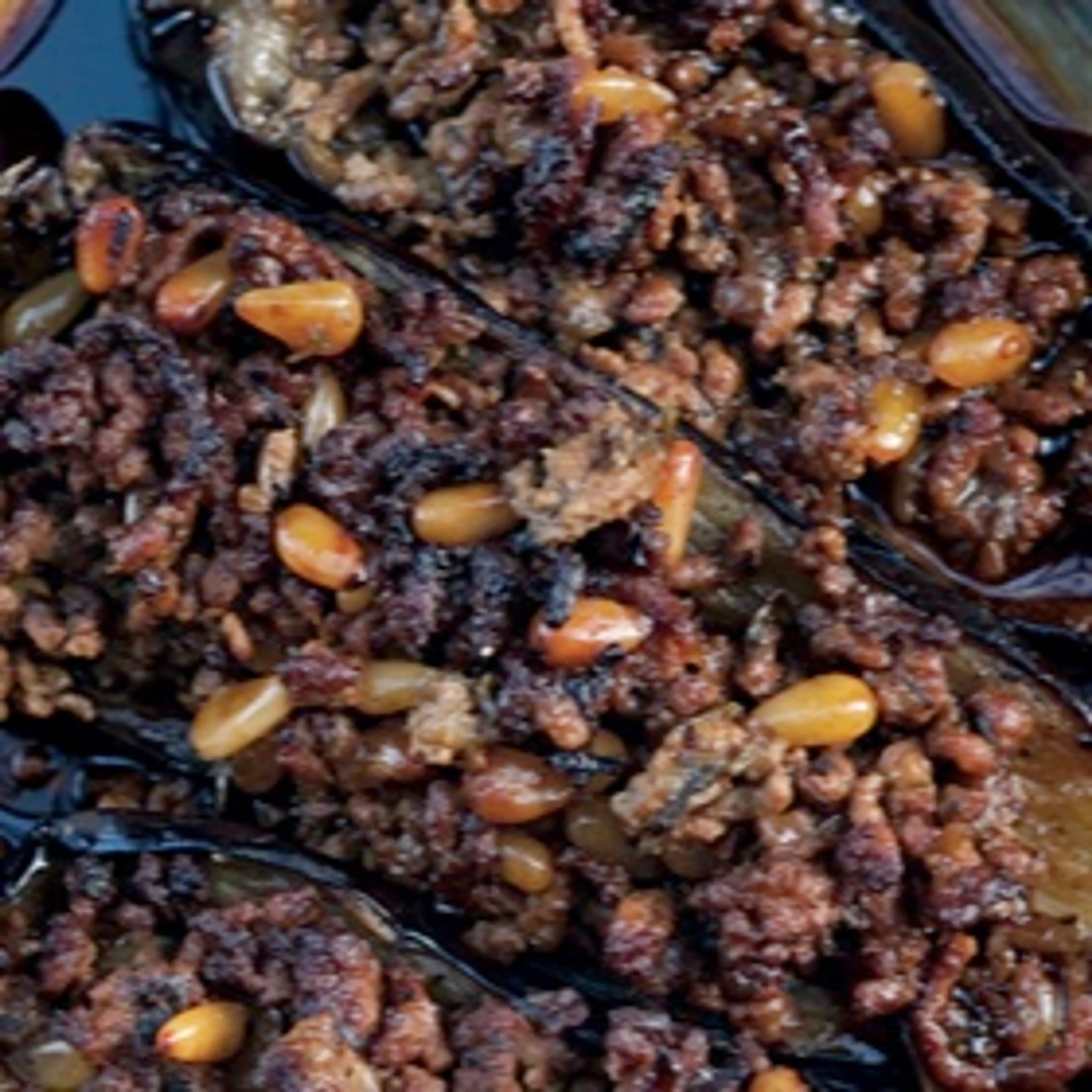 Eggplant Roasted with Spiced Lamb and Pine Nuts