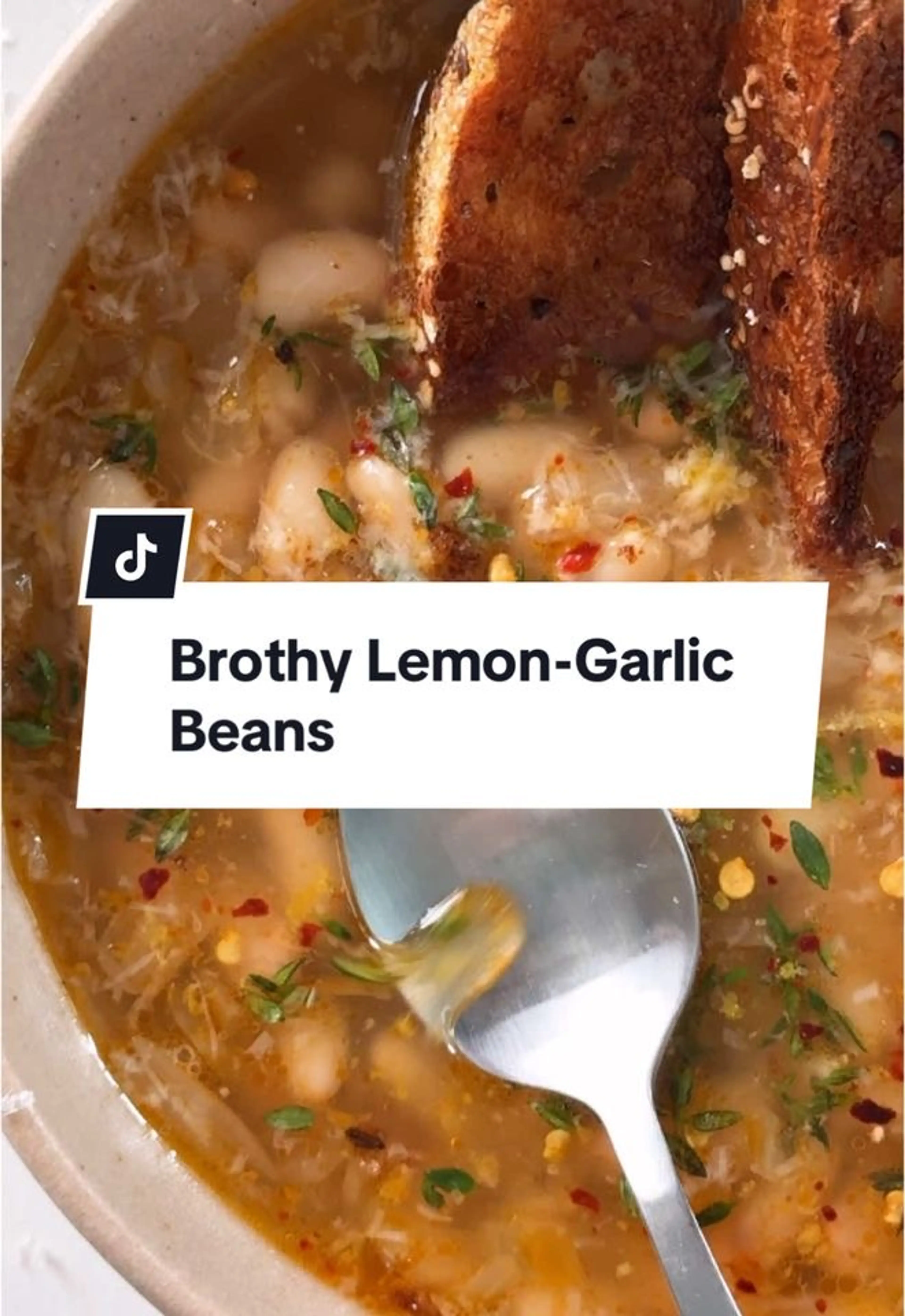 The Creamy Beans Soak Up the Garlicky, Lemon-infused Broth T