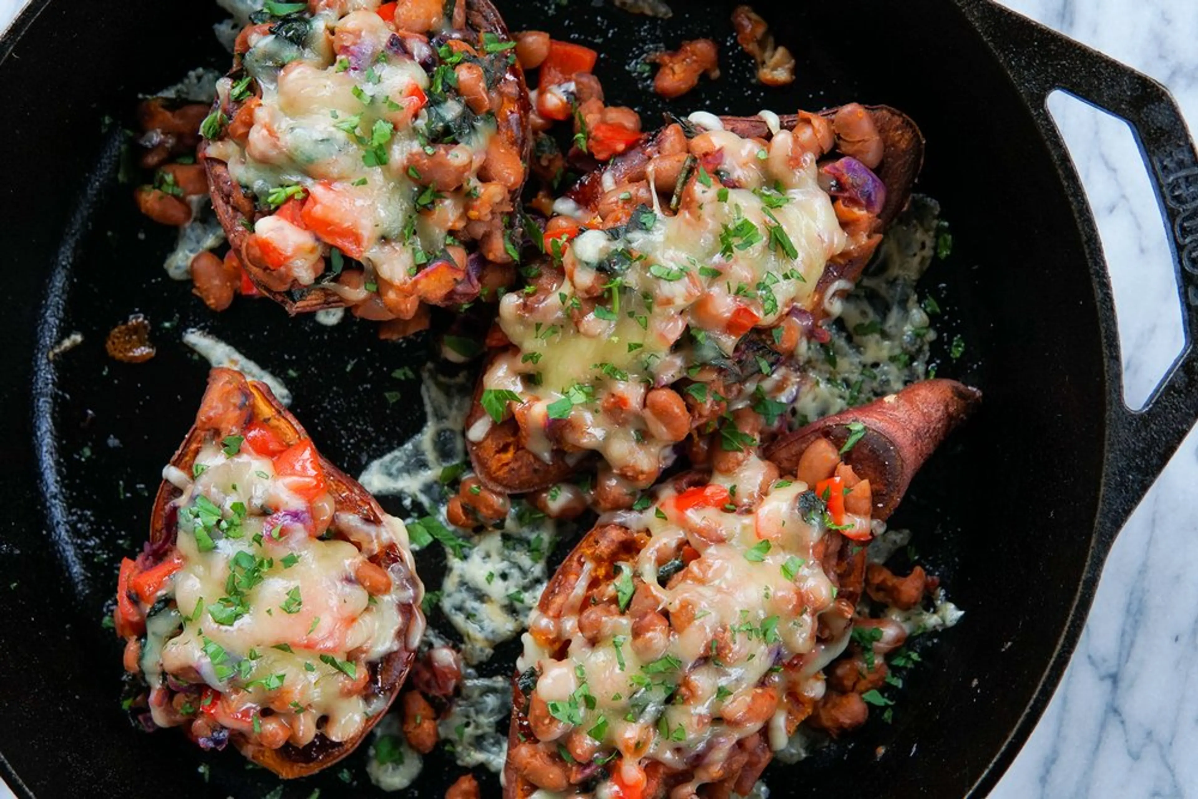 Cheesy Tomato + Bean Stuffed Sweet Potatoes
