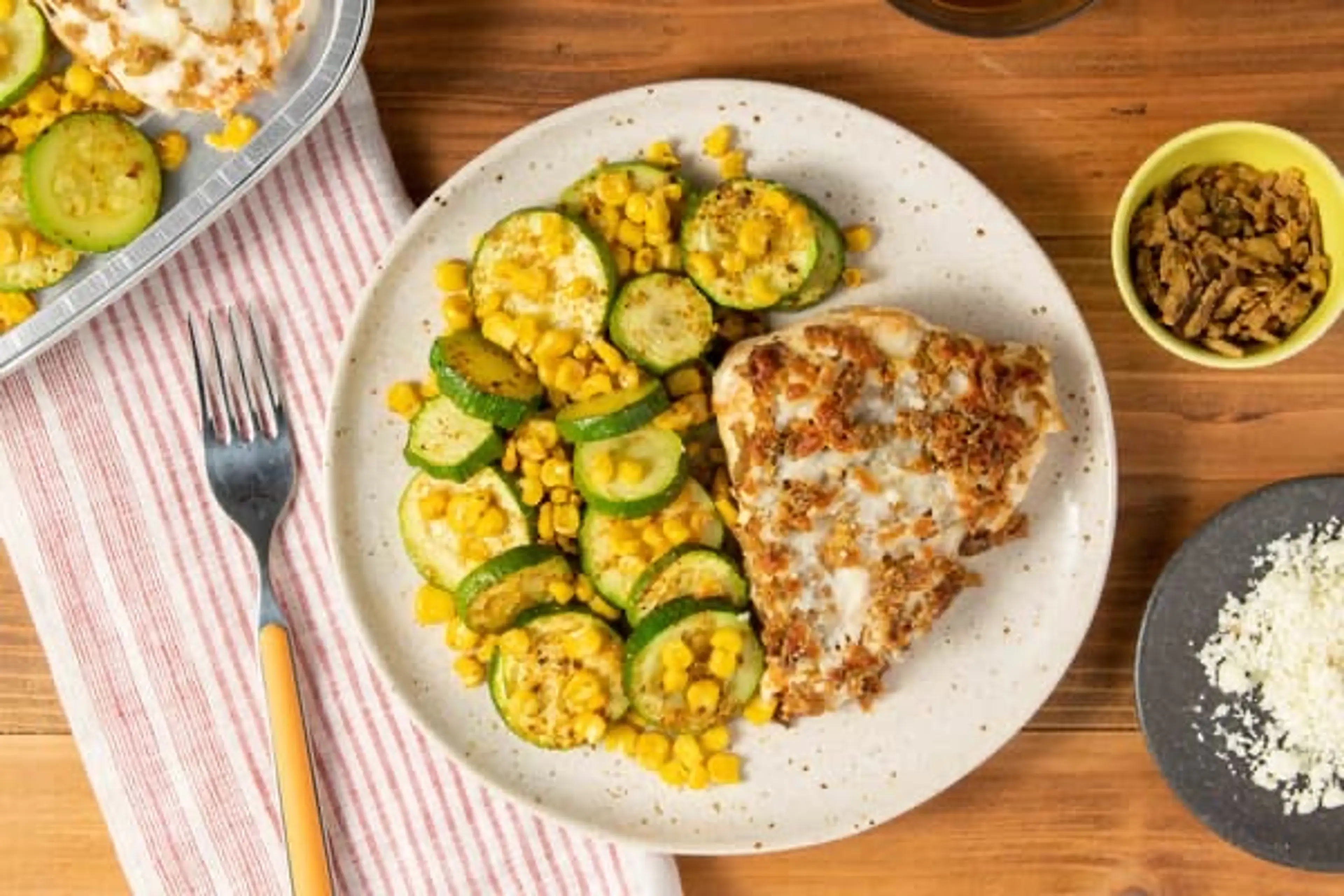 Cotija and Jalapeño-Crusted Chicken with Cajun-style zucchin
