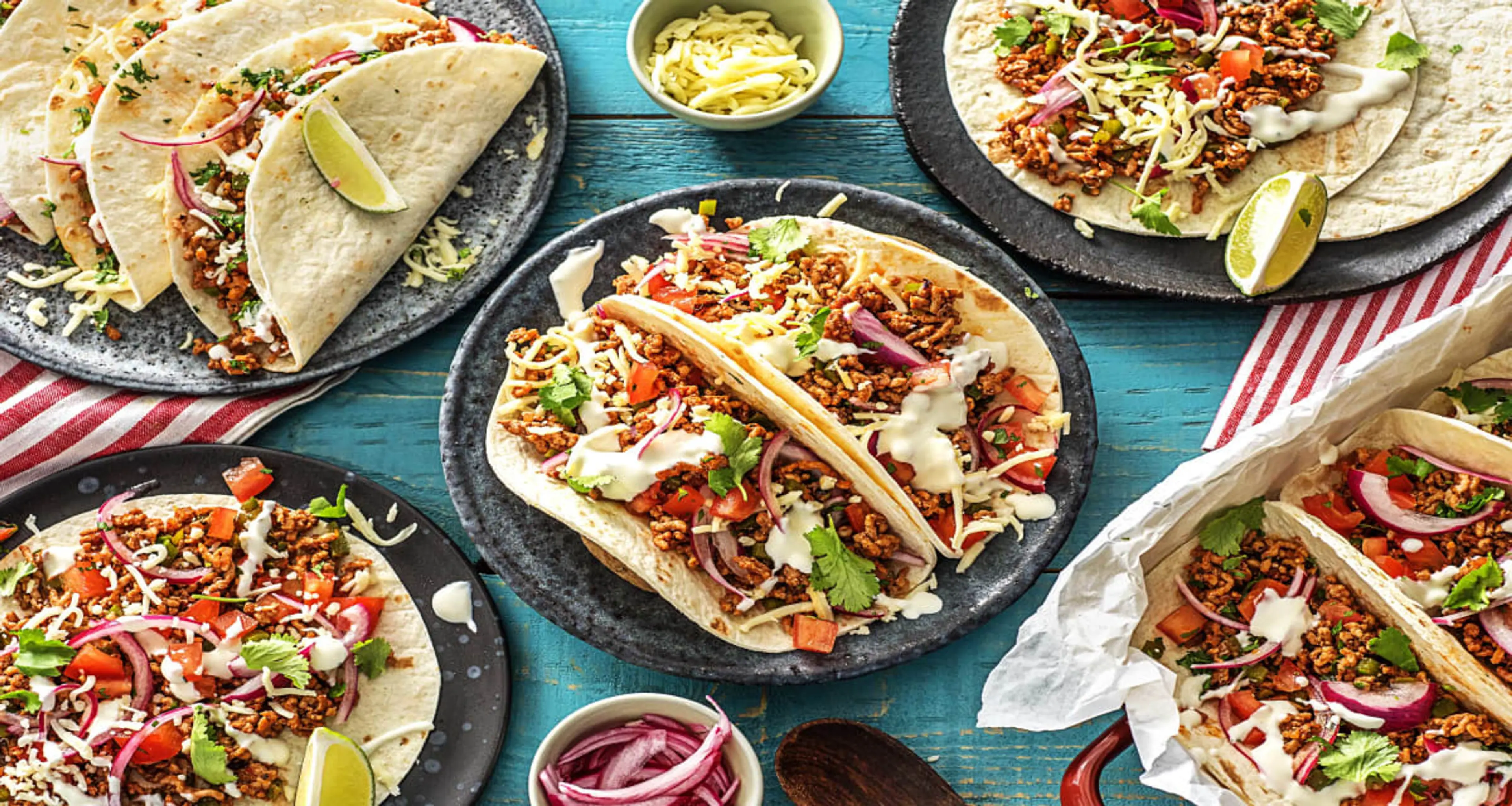 One-Pan Pork Carnitas Tacos with Lettuce, Onion, Lime Crema