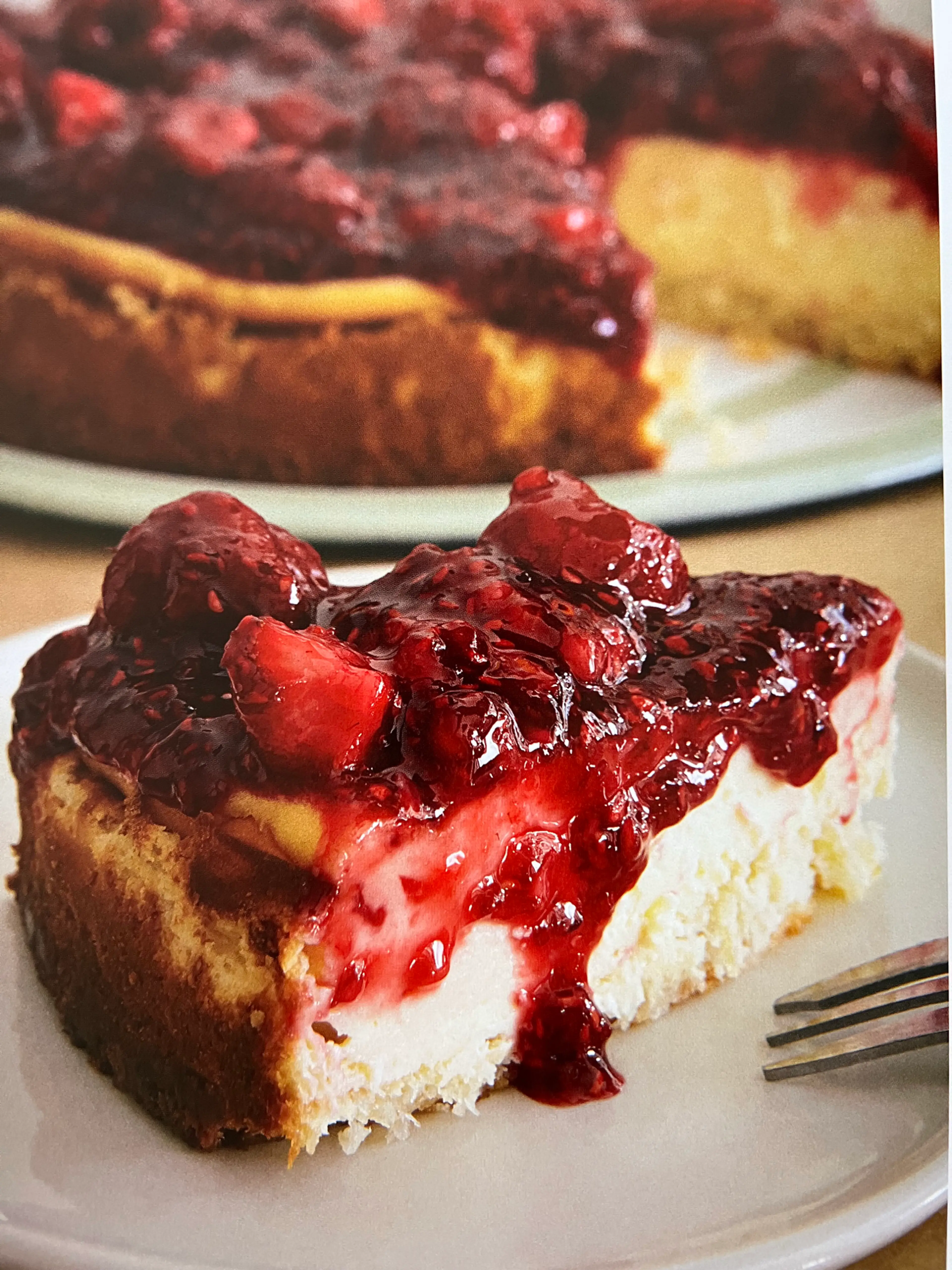Rose-scented Cheesecake on a Coconut Base with Berry Compote