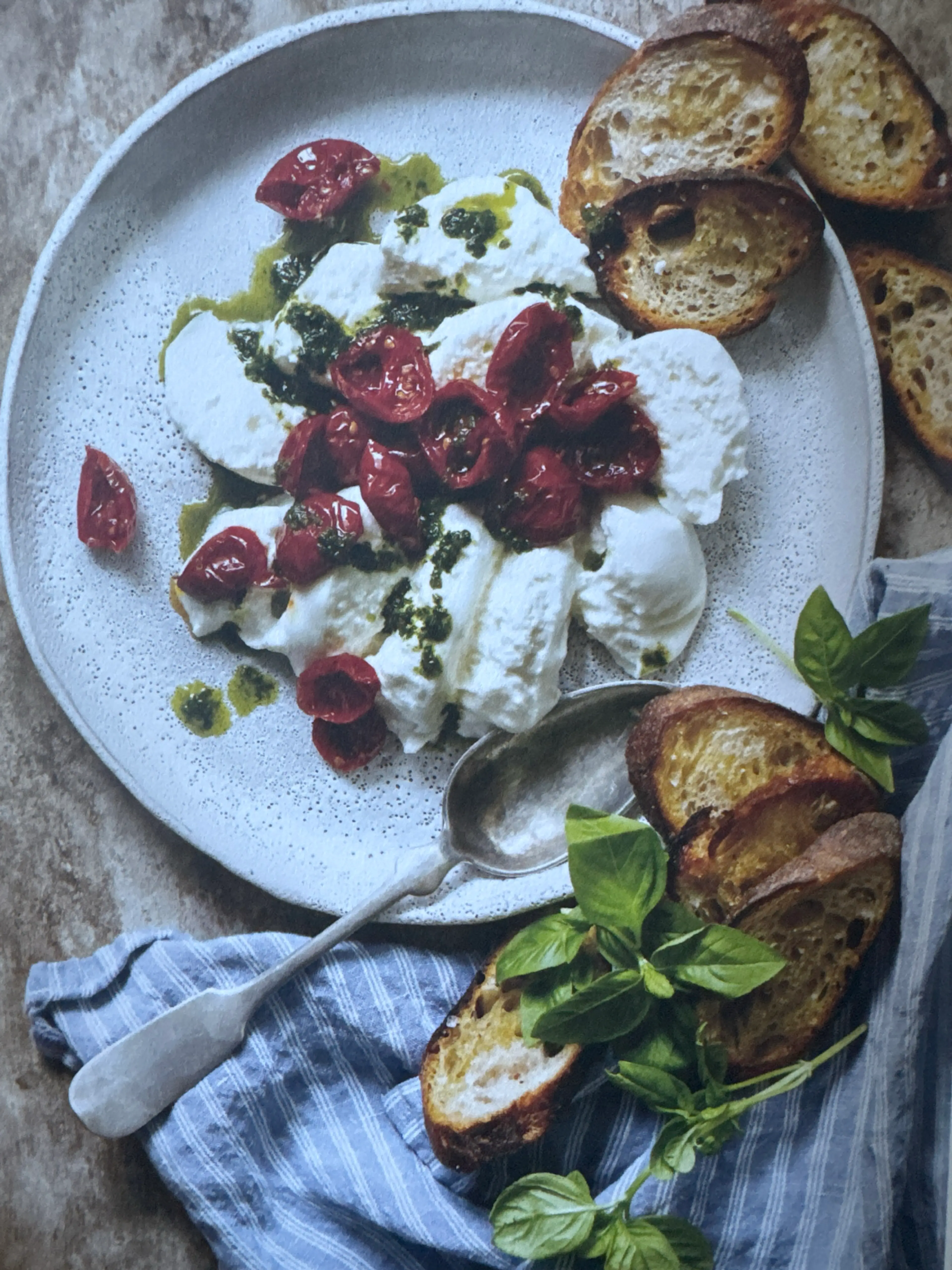 Pesto Burrata WITH ROASTED CHERRY TOMATOES