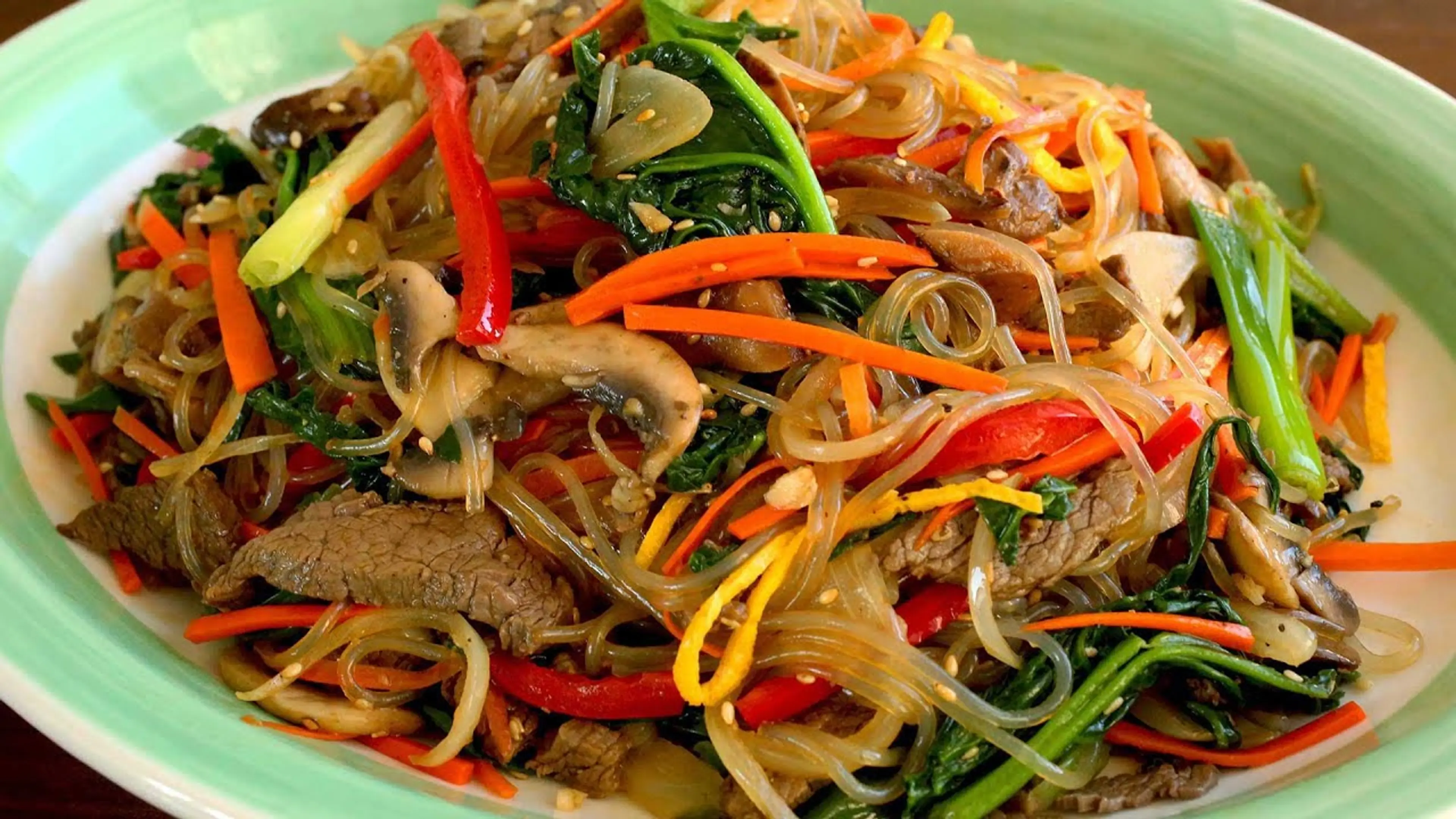 Japchae (Sweet potato starch noodles stir fried with vegetab
