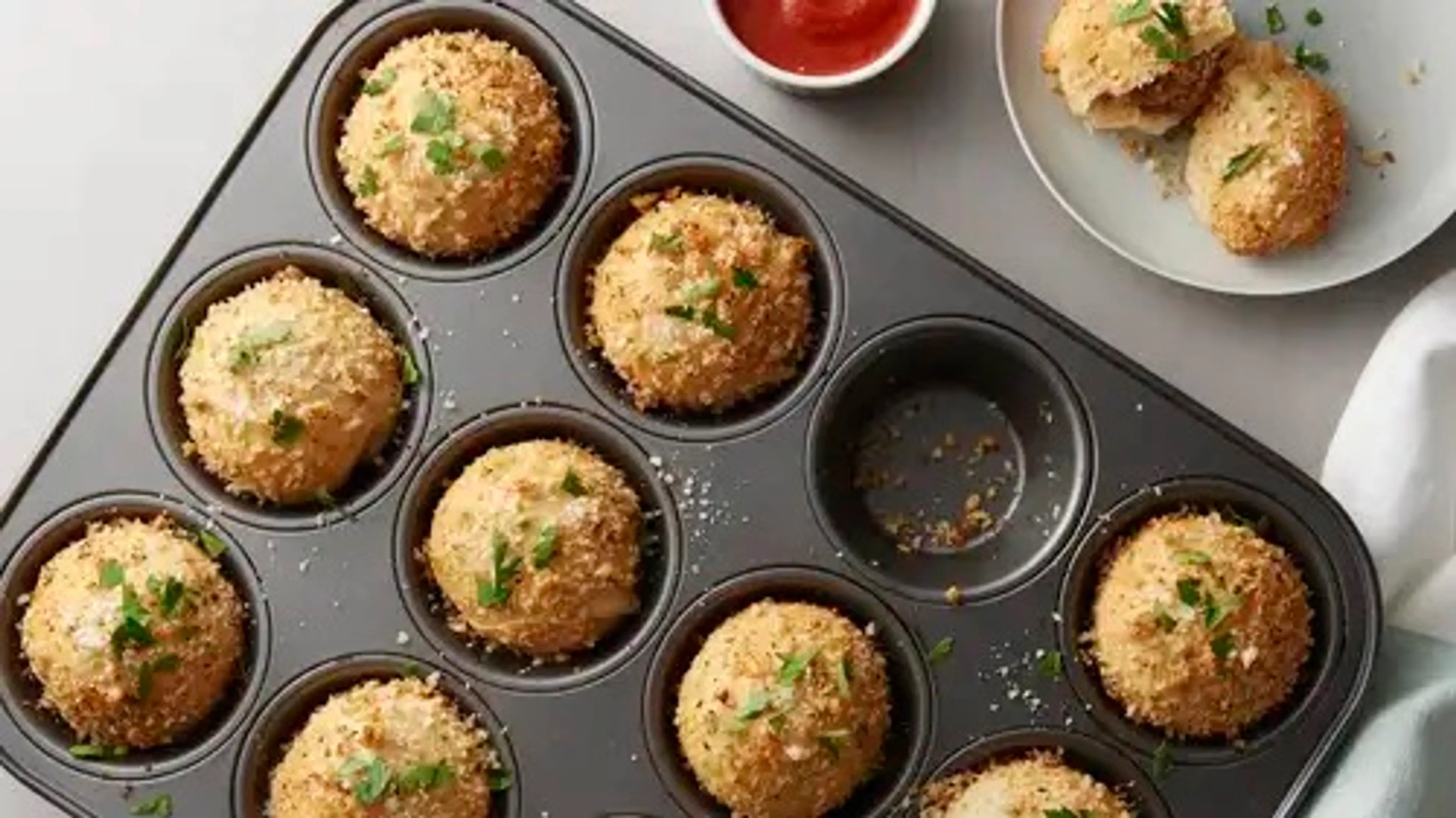 Muffin-Tin Cheesy Meatball Biscuit Bombs