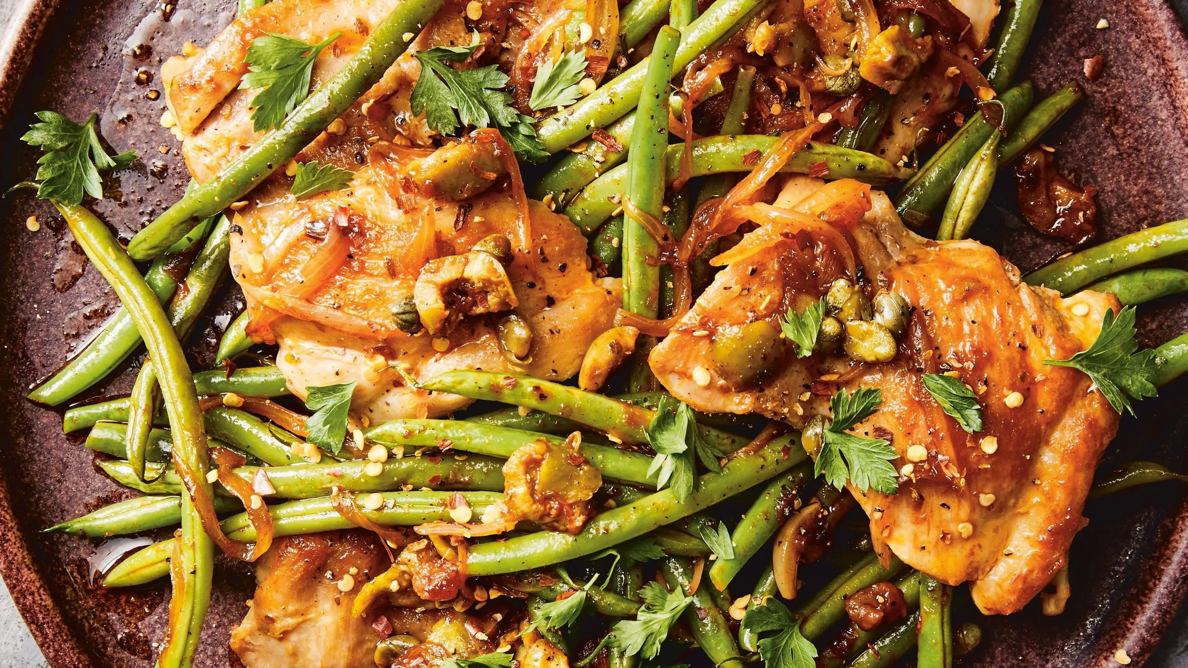 Crispy Chicken Thighs With Puttanesca Green Beans