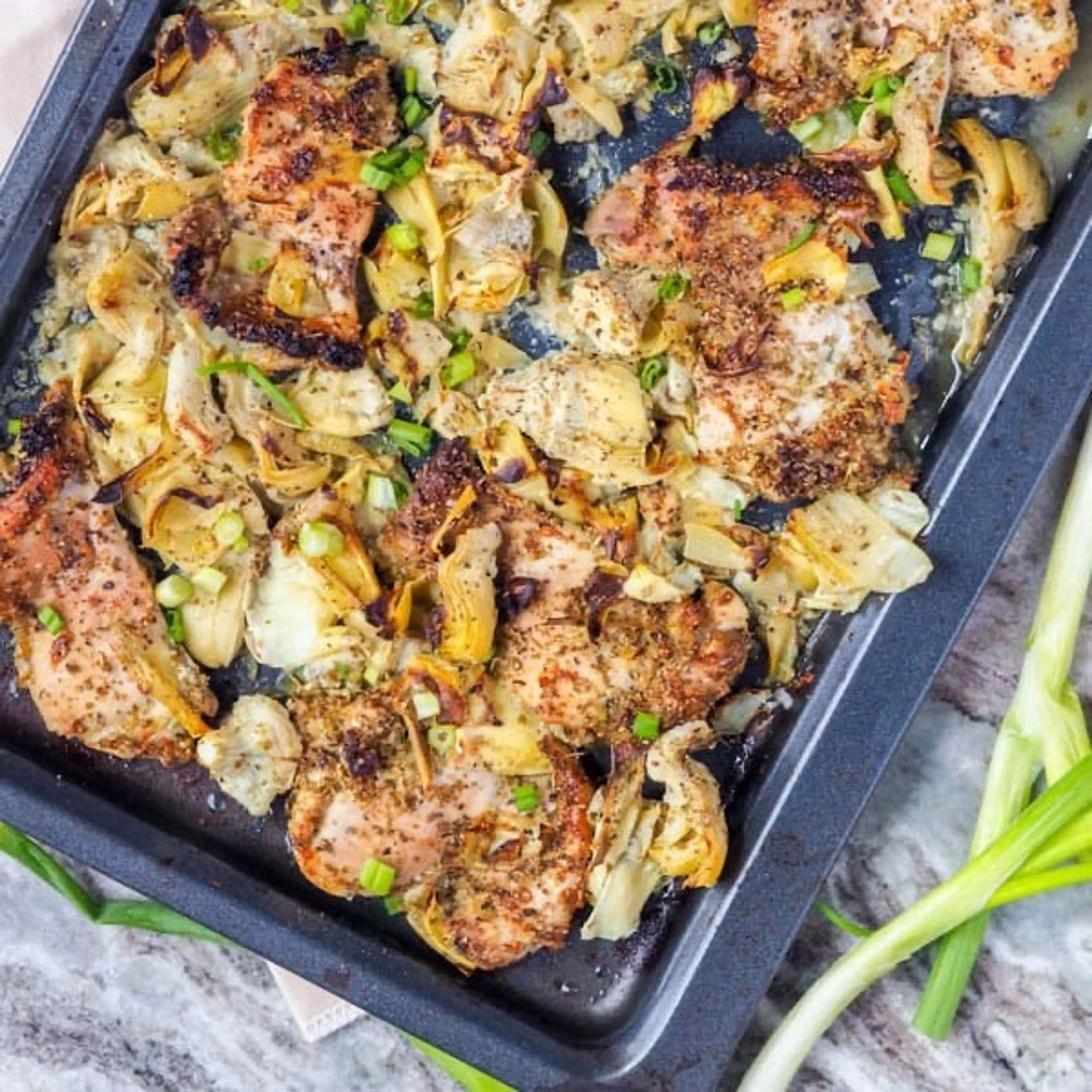 Broiled Chicken Thighs with Artichokes and Garlic