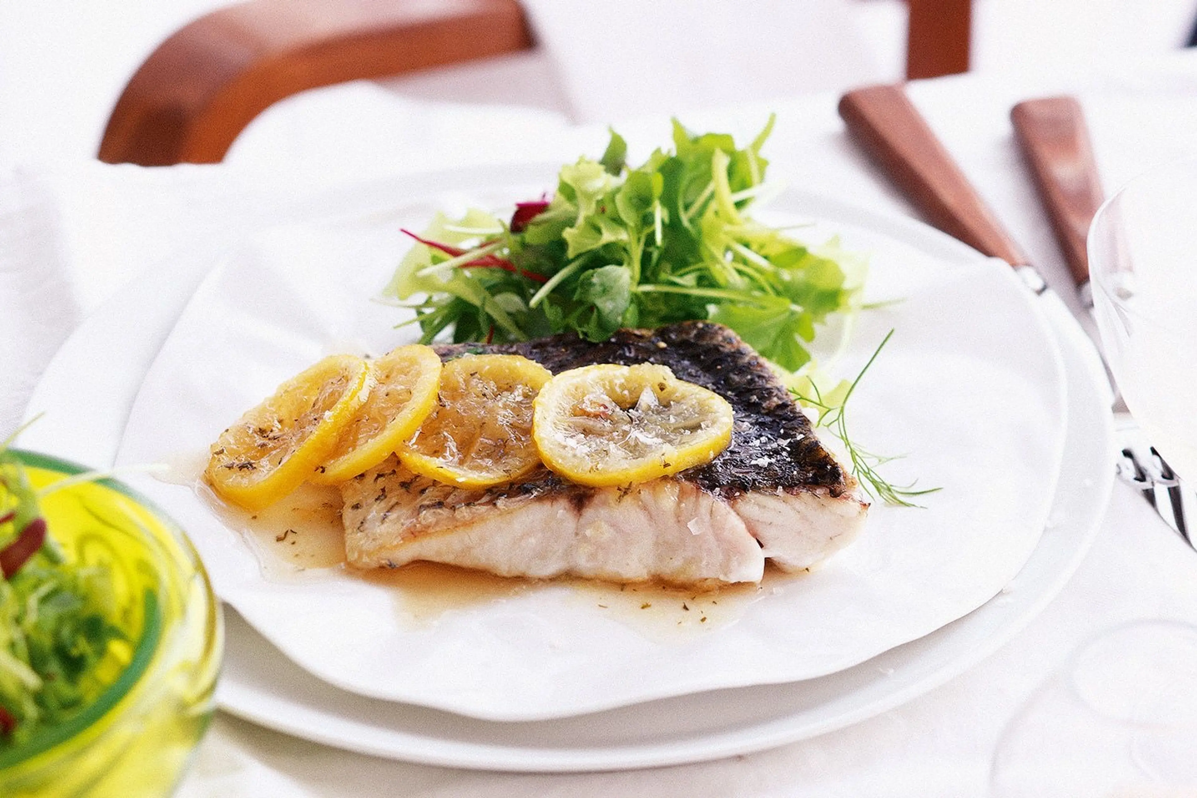 Pan-roasted wild barramundi with caramelised lemon