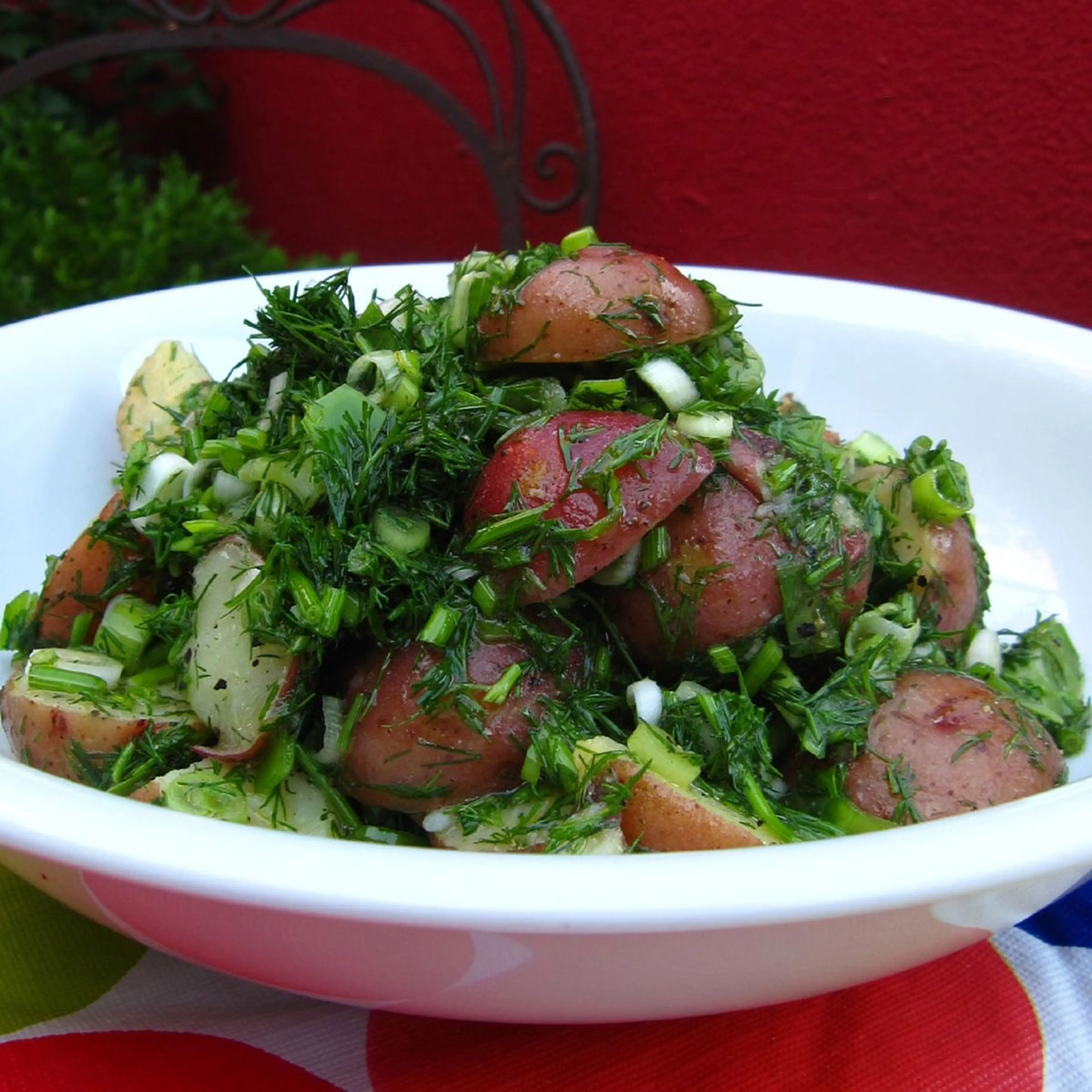 Potato salad with cider vinegar, dill and scallions