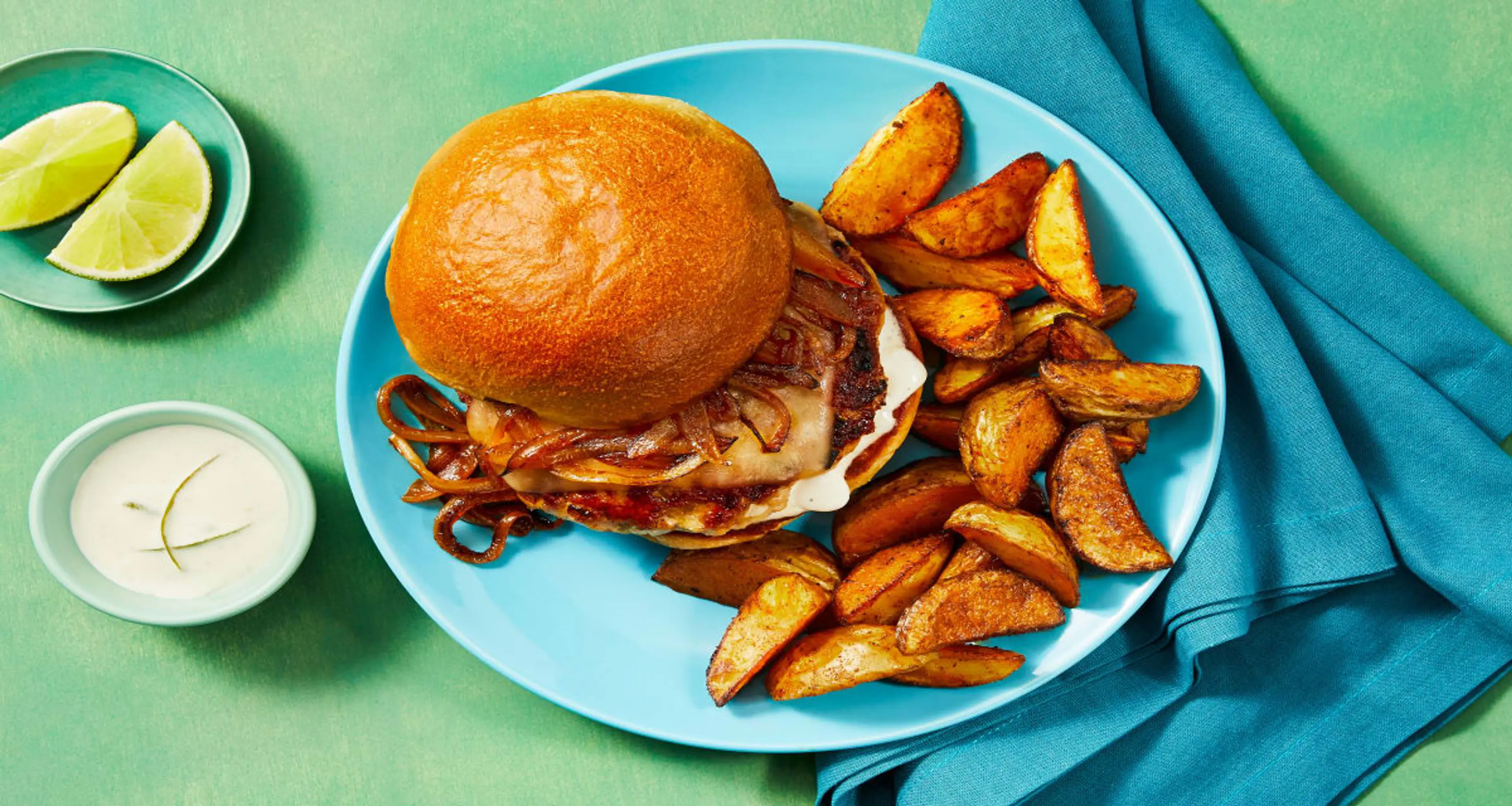 Gouda Pork Burgers with Caramelized Sriracha Onion and Potat