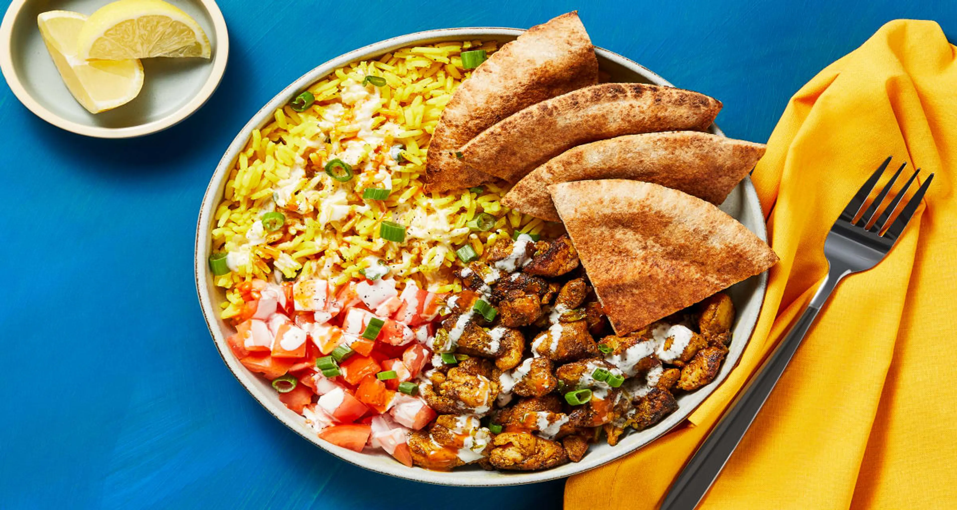 Street Cart-Style Chicken Bowls with Yellow Rice, White Sauc