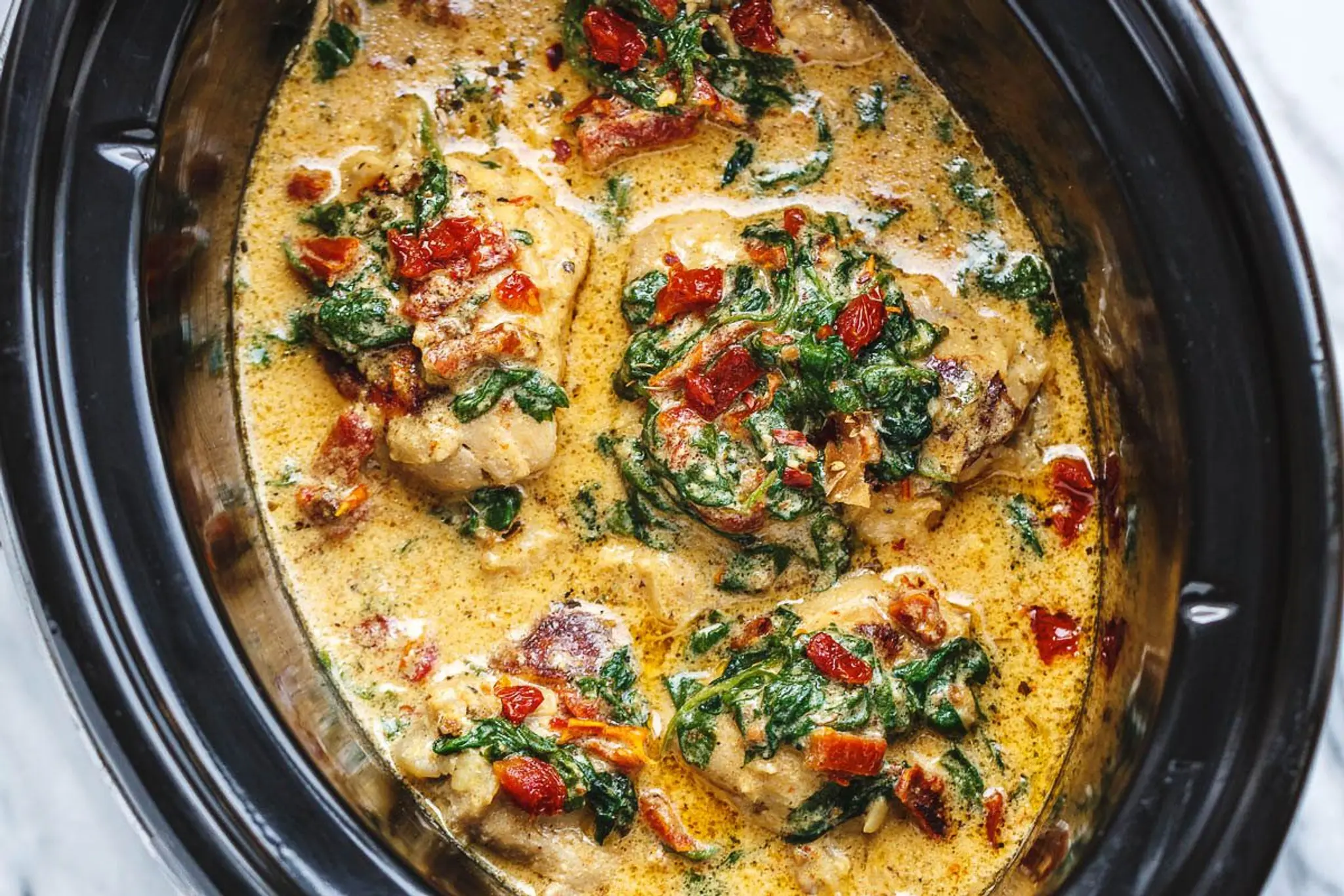 CrockPot Tuscan Garlic Chicken Thighs With Spinach and Sun-D