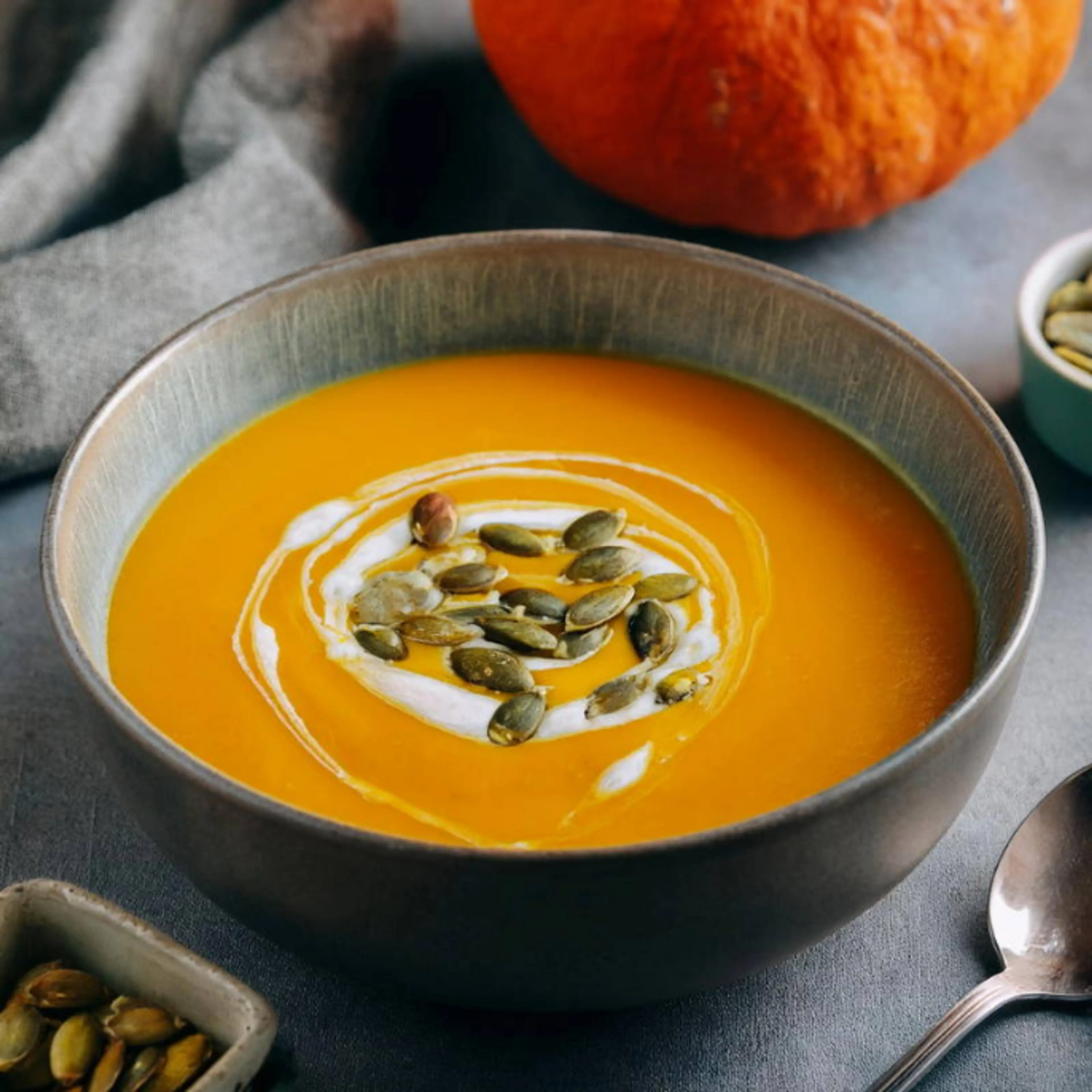 Creamy Hokkaido Pumpkin Soup with Roasted Seeds and a Dash o