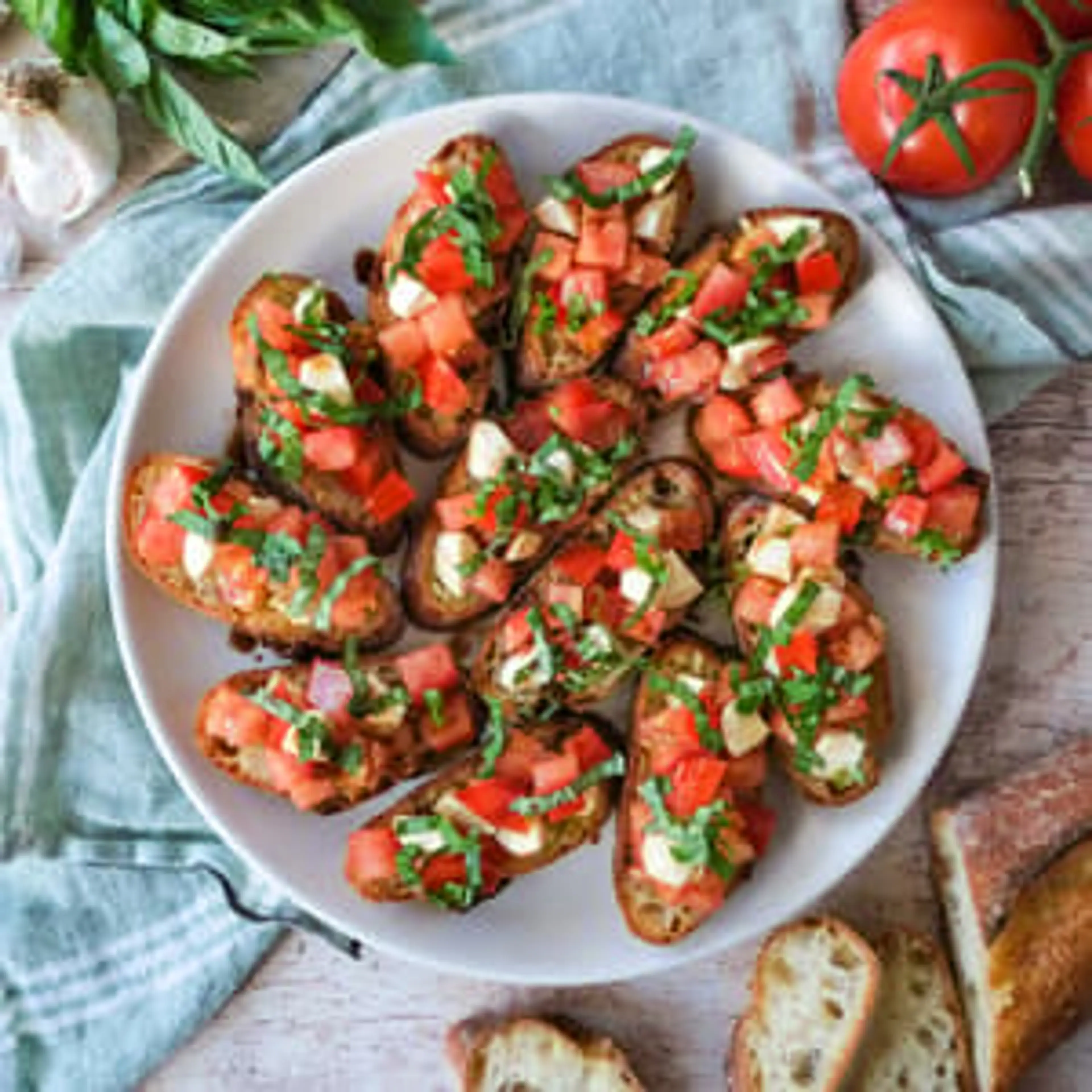 Tomato, Mozz & Basil Bruschetta w/ Balsamic Drizzle