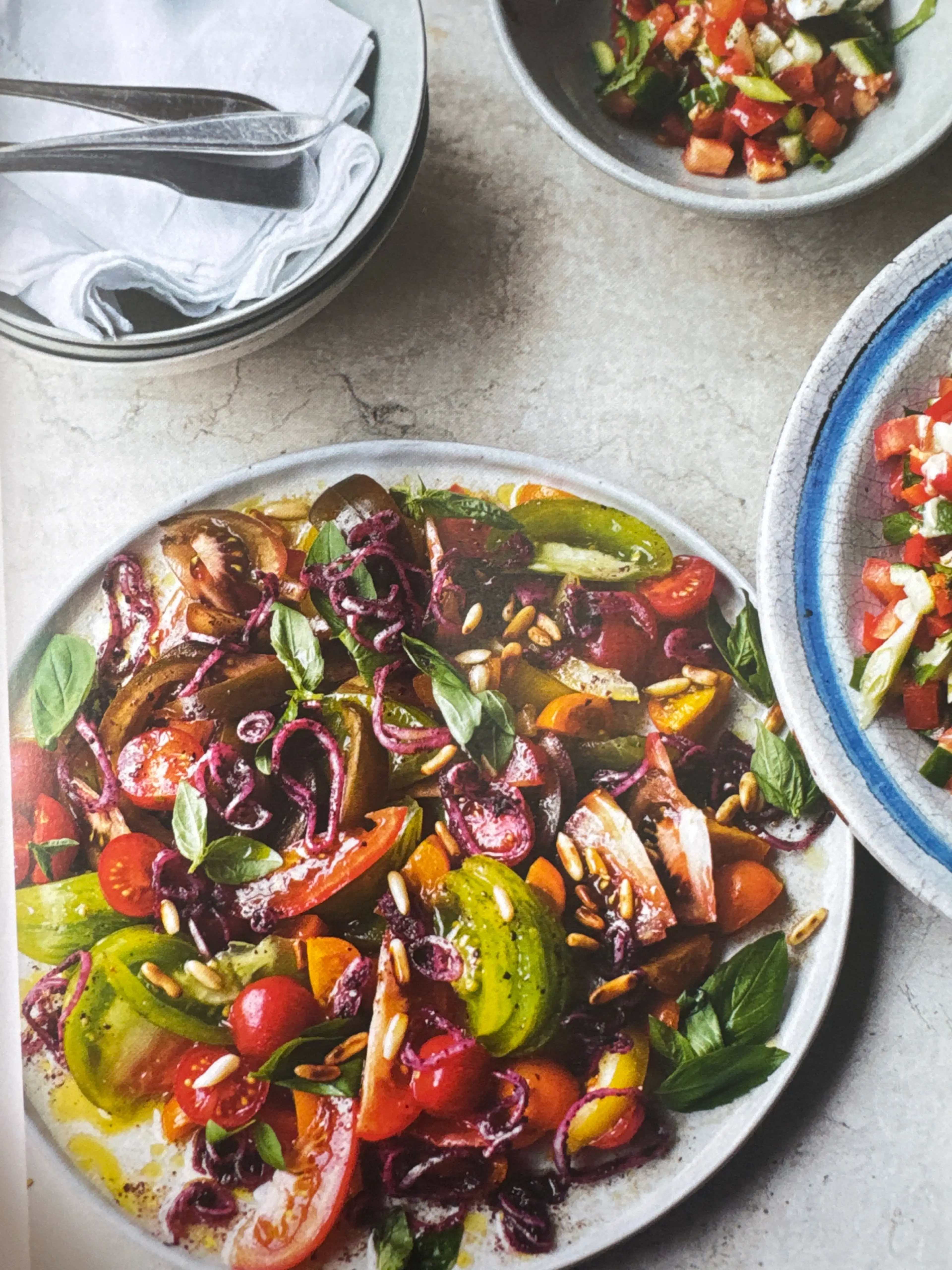 Tomatoes With Sumac Onions and pine nuts