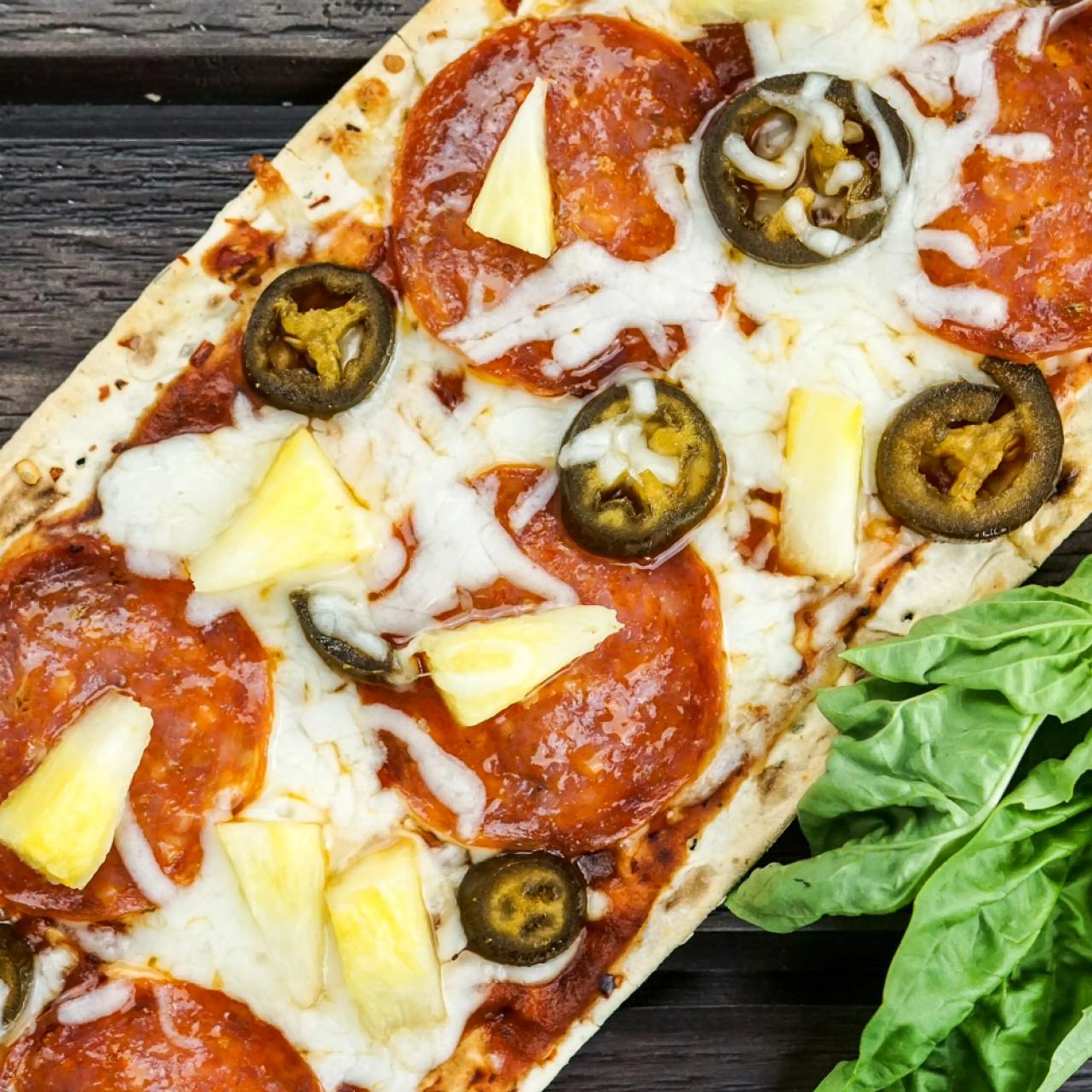 Pepperoni, Pineapple, and Jalapeno Pizzas