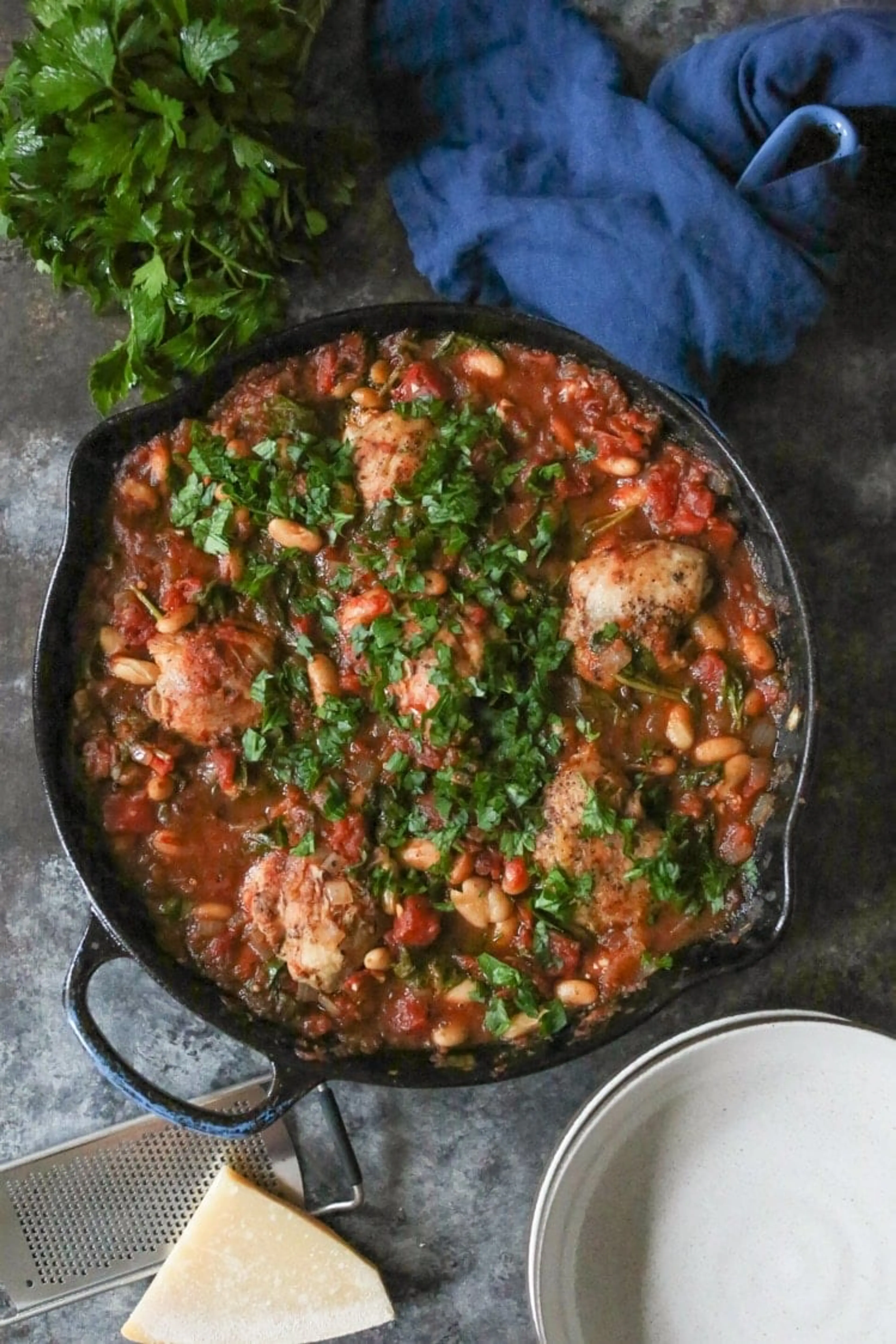 One Skillet Braised Chicken Thighs with Spinach and Cannelli