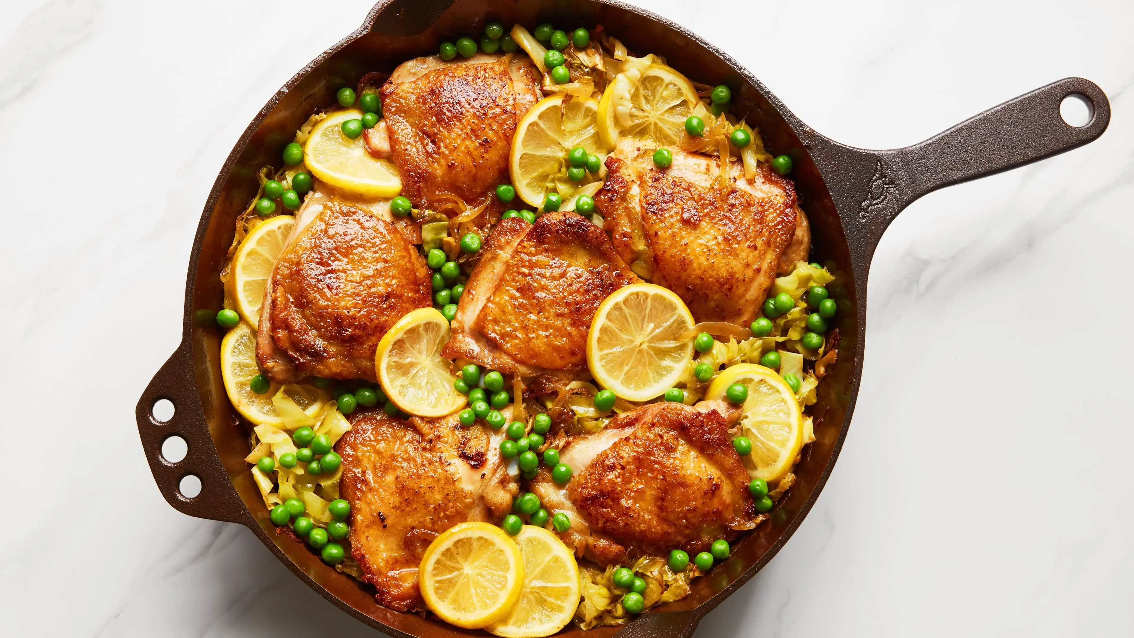 One-Pan Crispy Chicken With Turmeric-Lemon Cabbage and Peas