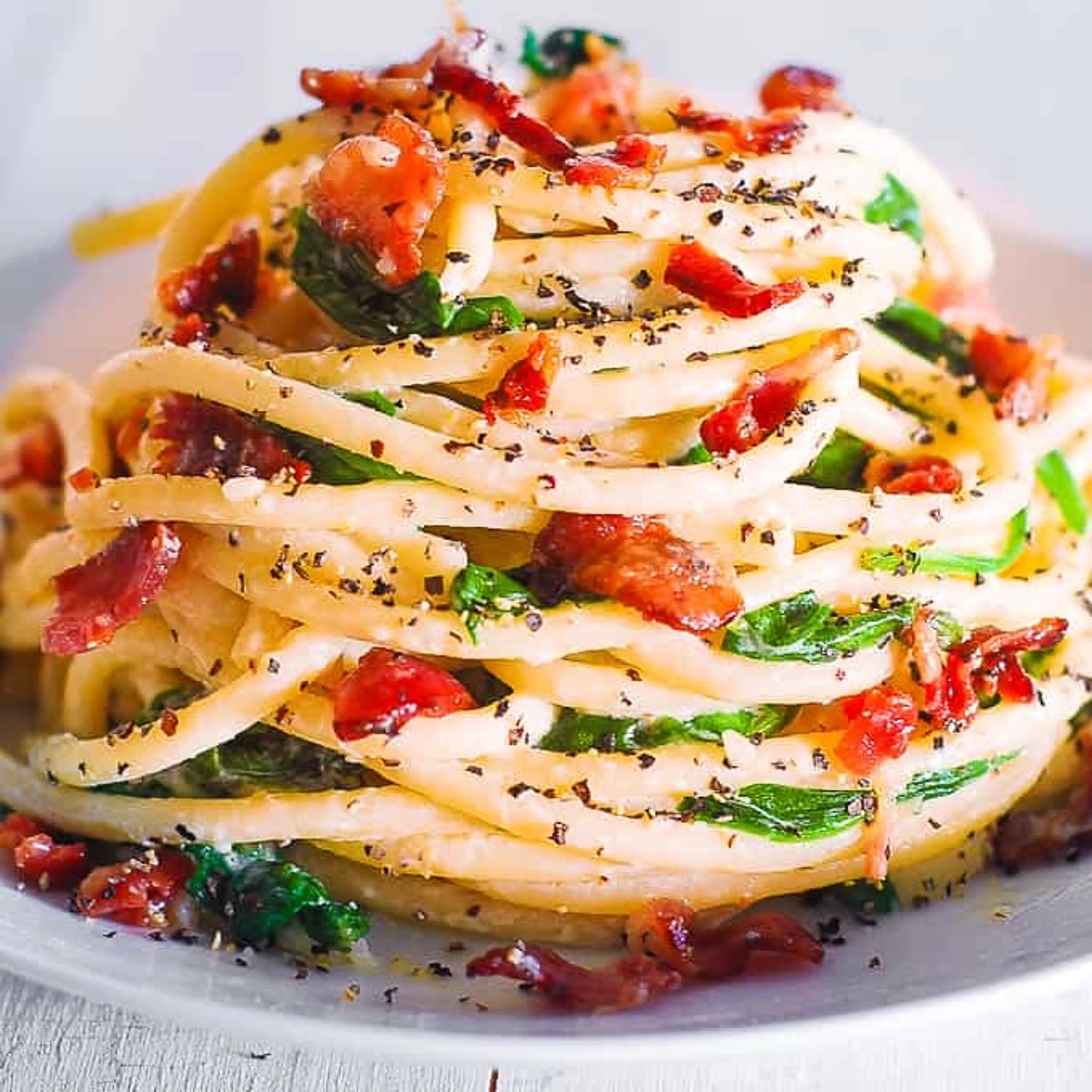 Bucatini with Spinach, Bacon, Creamy Parmesan Sauce