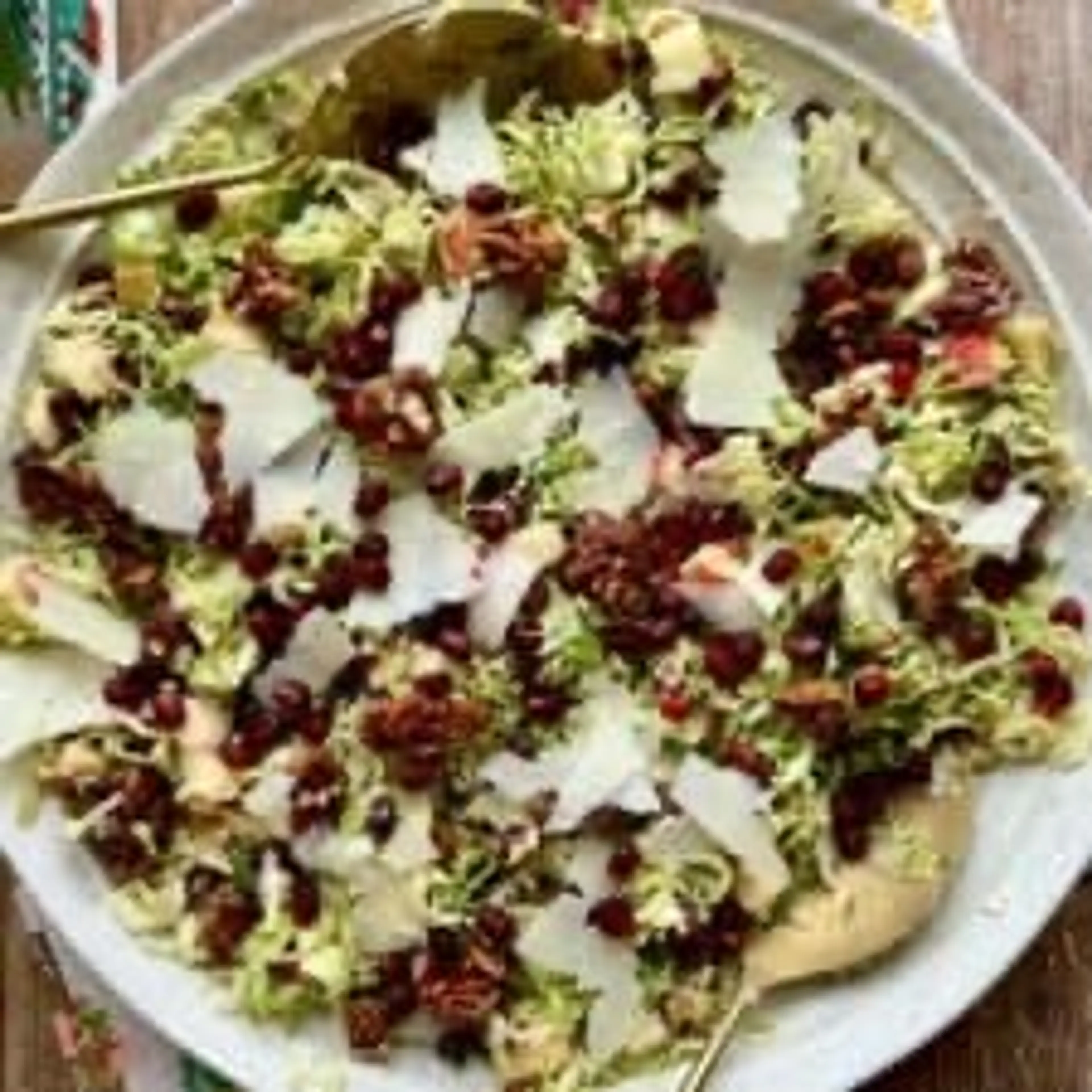 Shaved Brussels Sprout Salad with Pomegranate and Candied Pe