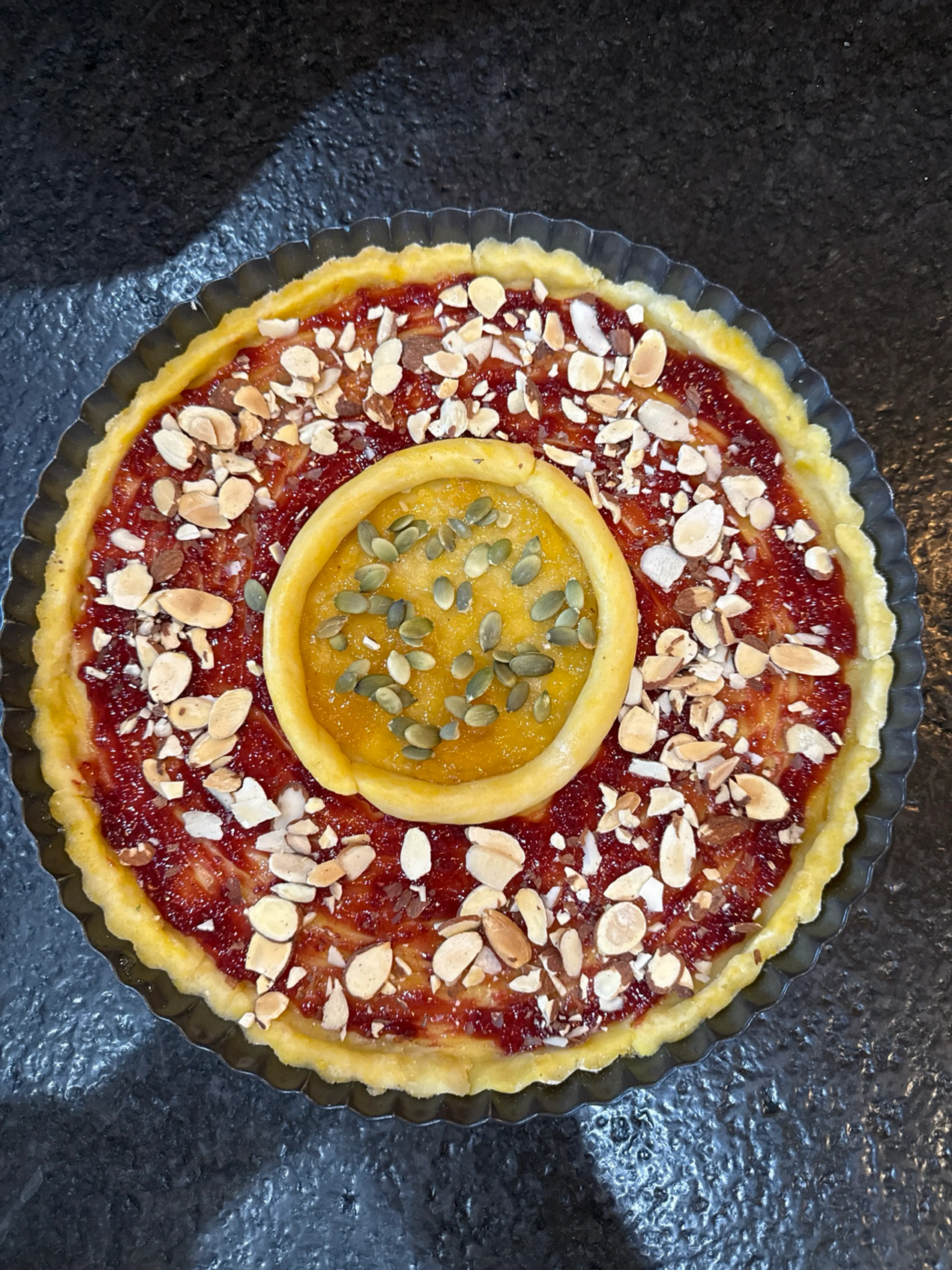 tart with homemade jams and seeds