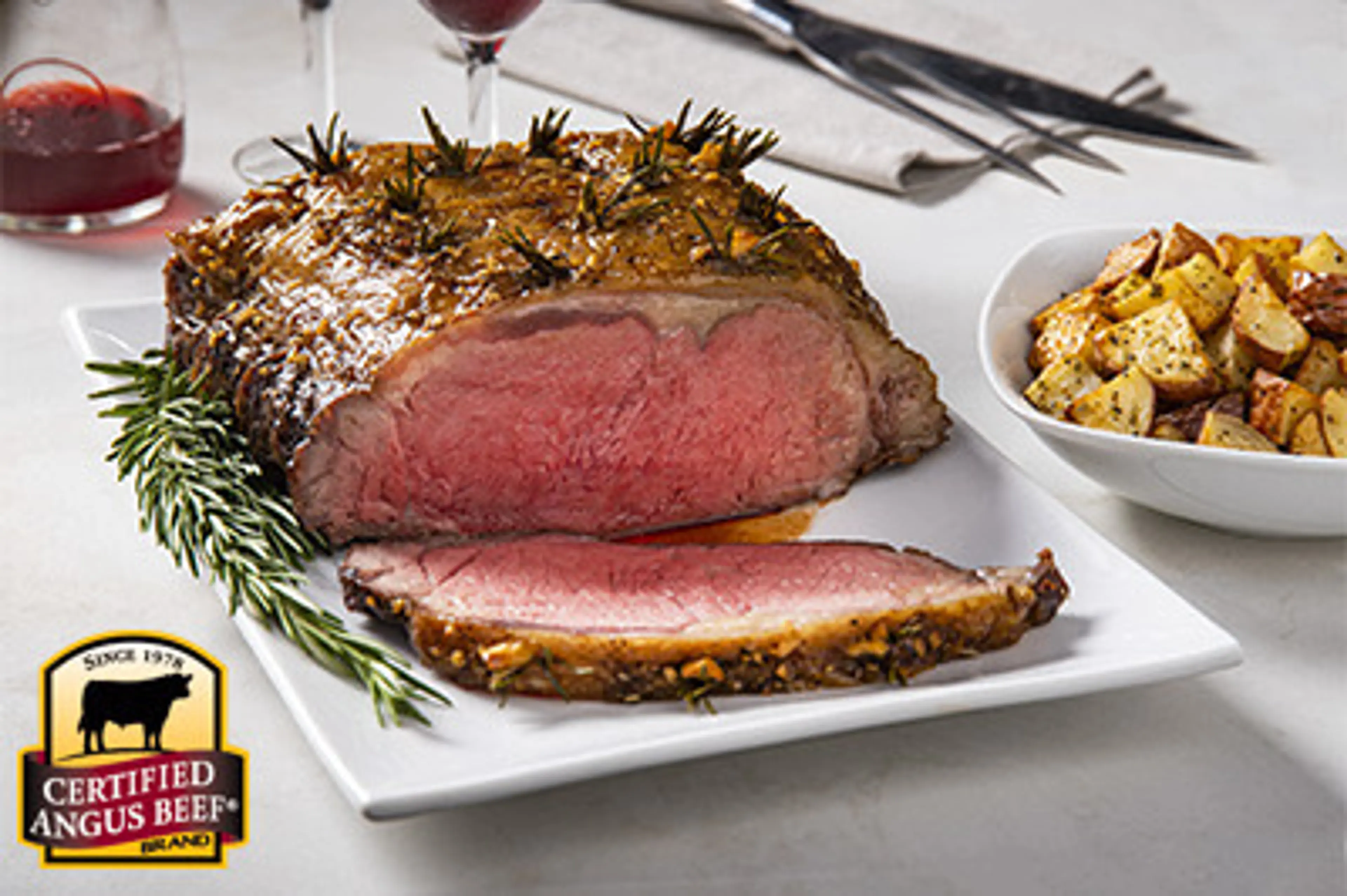Garlic & Rosemary Studded Strip Roast