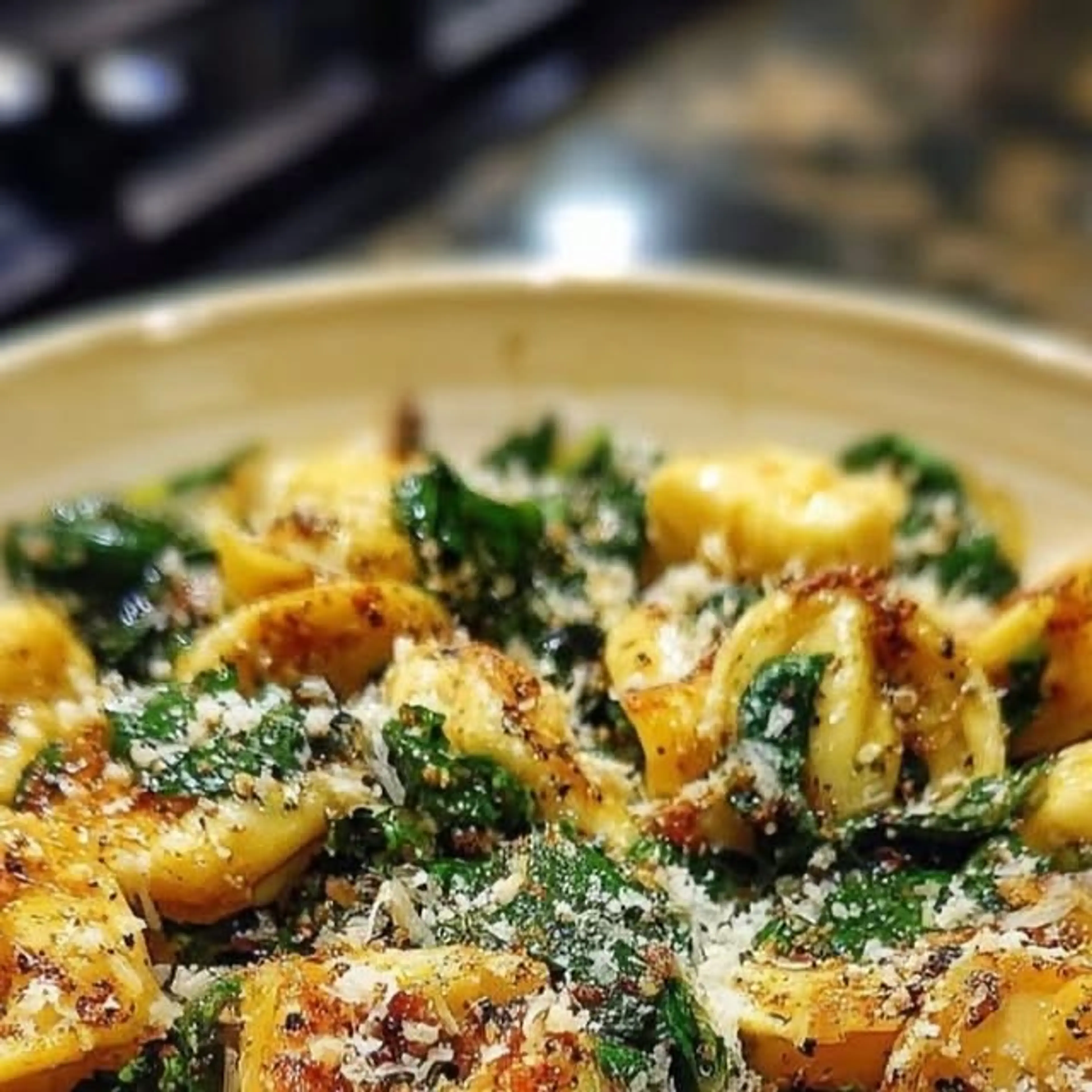 Crispy Parmesan Tortellini & Spinach with Lemon Drizzle