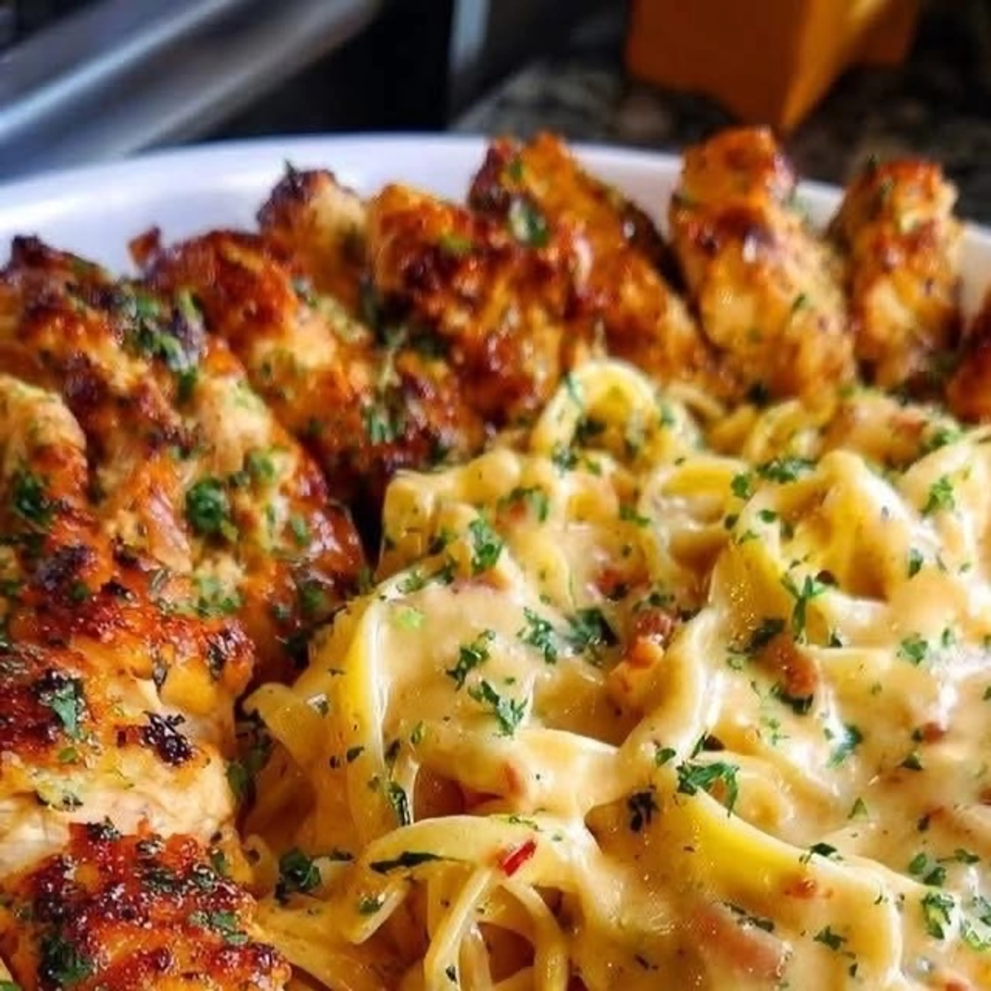 Cajun Garlic Butter Chicken Over Creamy Parmesan Linguine (s